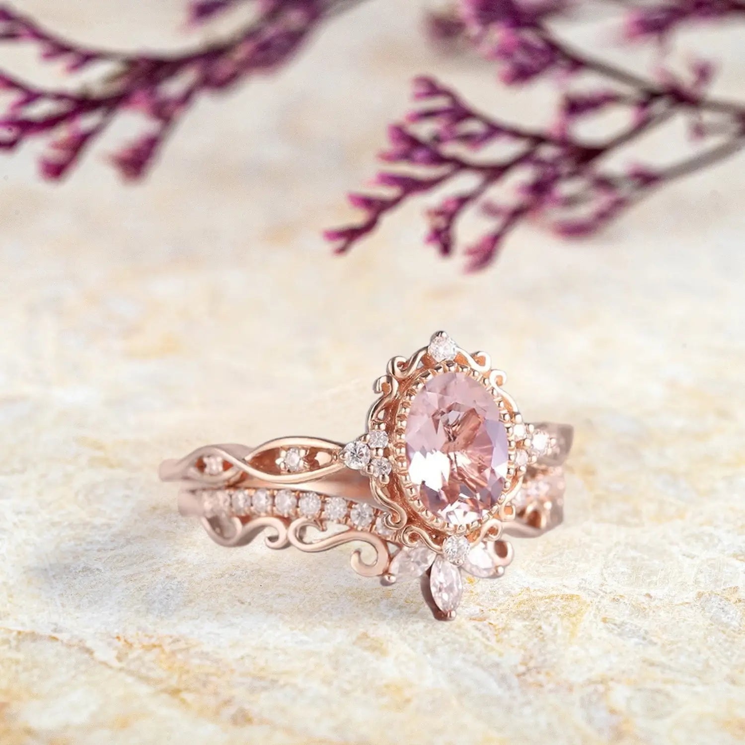 Side view of oval morganite ring showing vintage crown bezel setting and curved wedding band profile