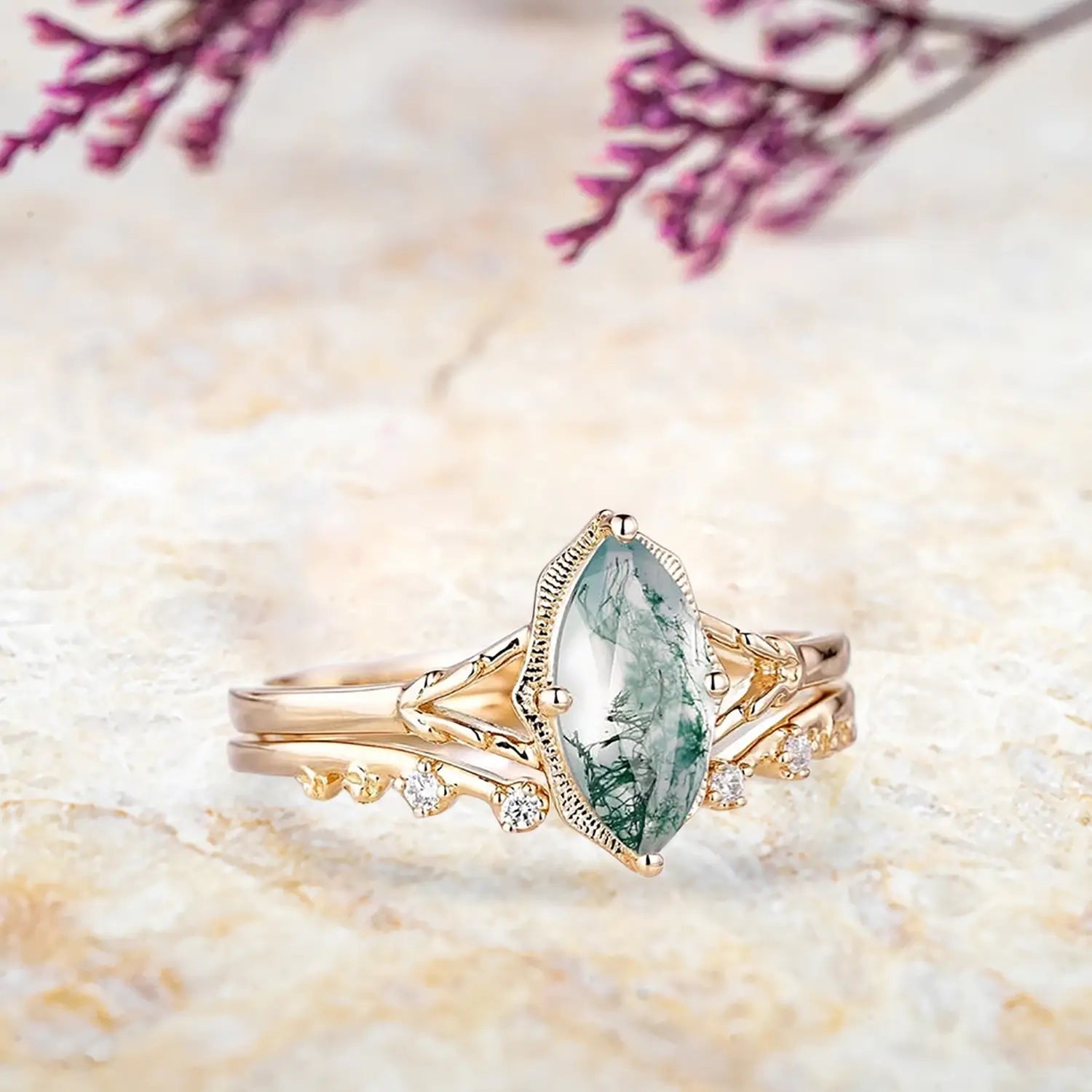 Side view of marquise moss agate ring showing vintage milgrain bezel and split shank with open curved wedding band profil