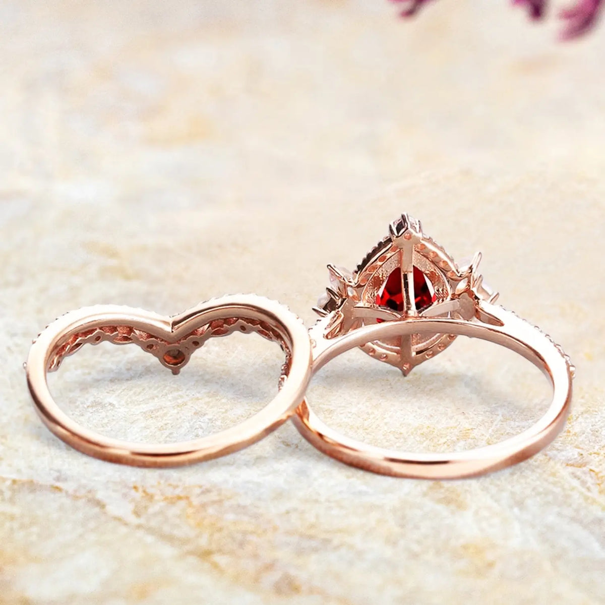 Back view of ruby pearl moonstone engagement ring set showing vintage cluster and wedding band craftsmanship