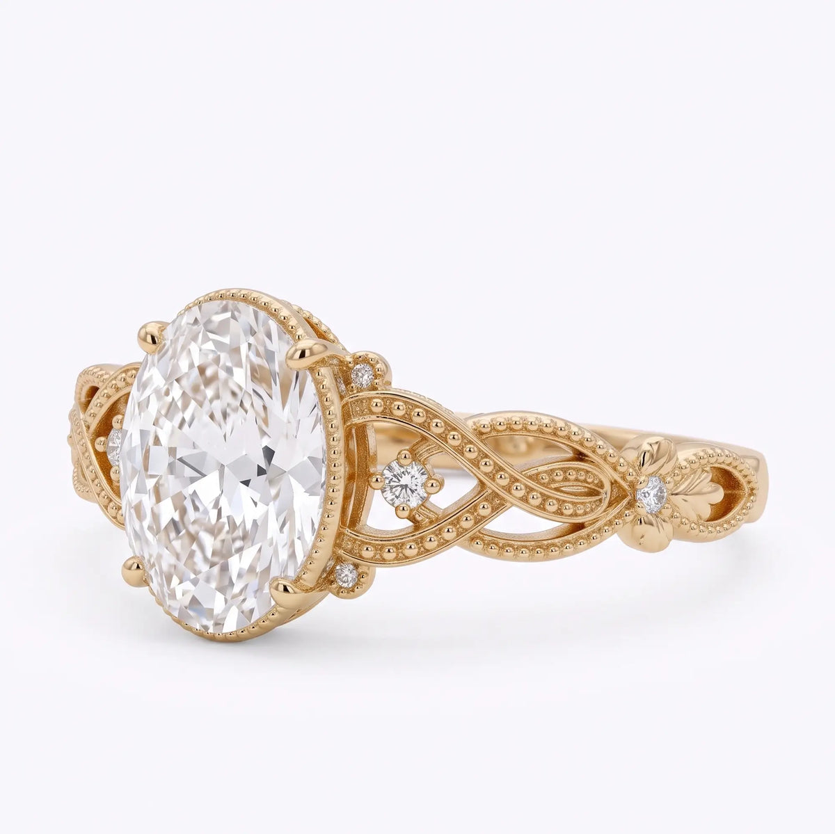 Opposite side of Virelisse Edwardian-inspired oval moissanite engagement ring, highlighting the flowing filigree band and floral metalwork.
