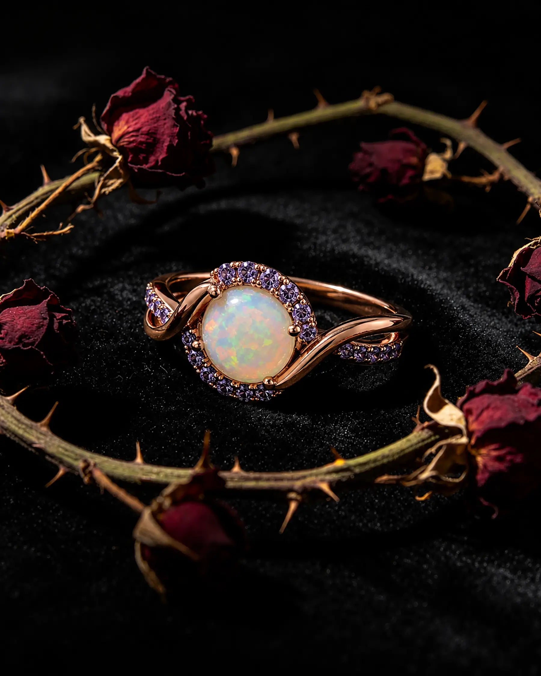 Vintage opal ring on dark velvet for the gemstone regret and care guide