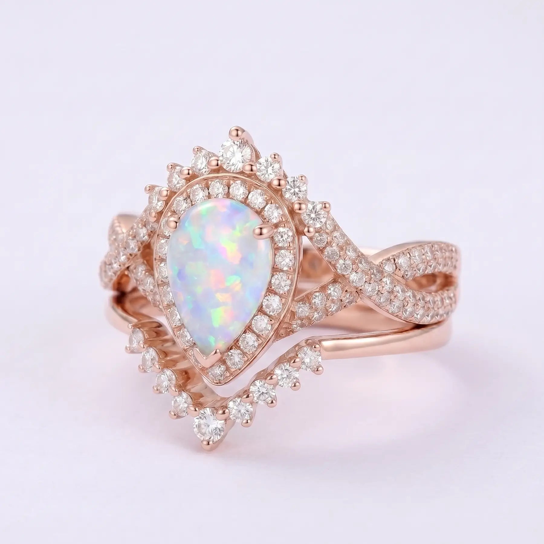 Celestia Loop – 2pc Infinity Halo Opal Engagement Ring Set Pear Cut