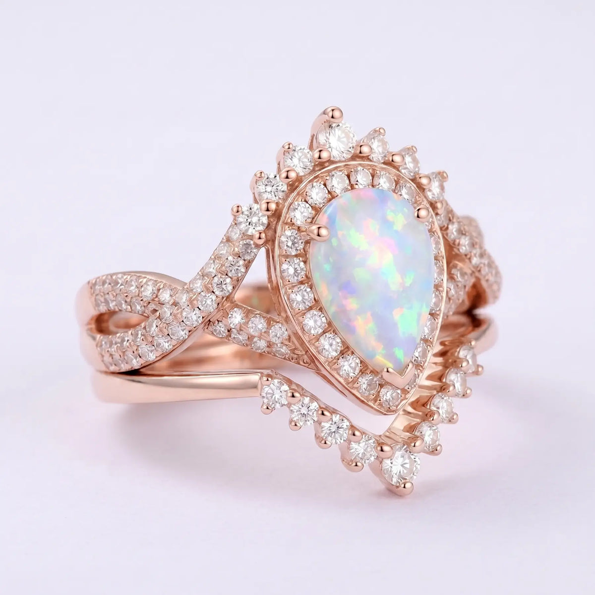 Celestia Loop – 2pc Infinity Halo Opal Engagement Ring Set Pear Cut