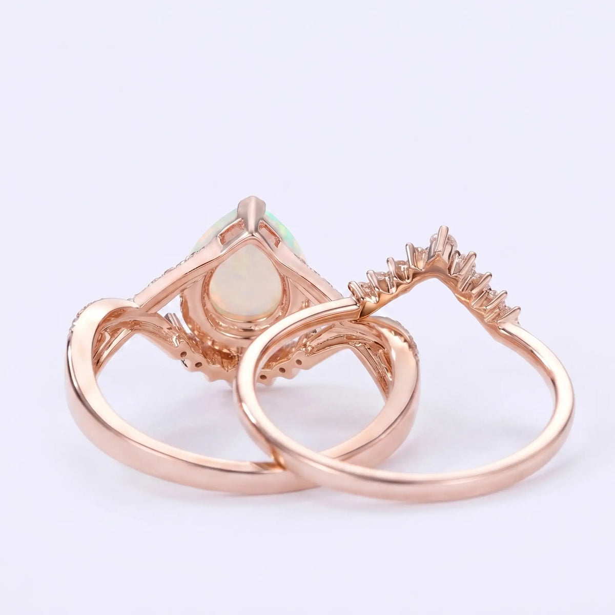 Celestia Loop – 2pc Infinity Halo Opal Engagement Ring Set Pear Cut
