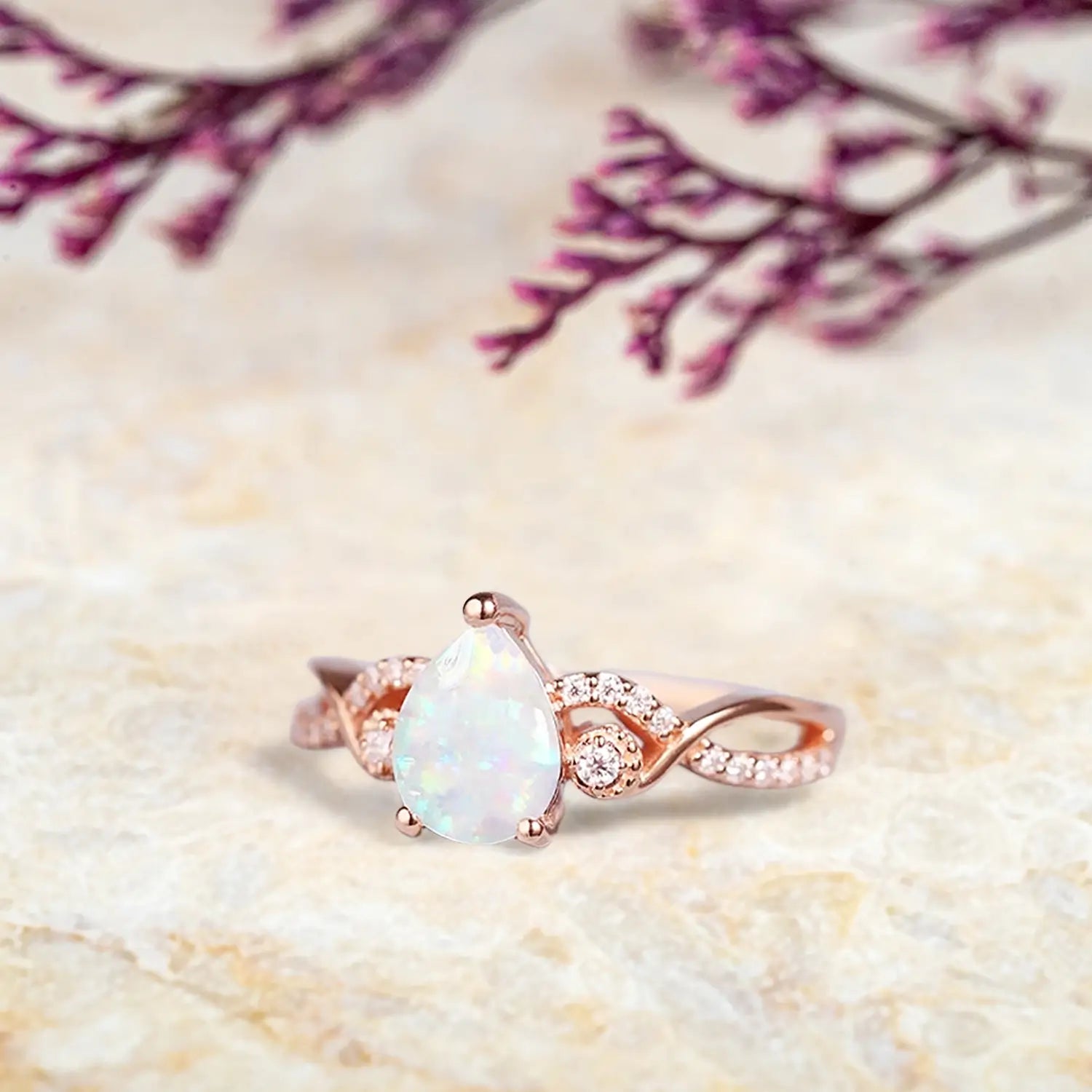 orleone Pear Cut Opal Engagement Ring | Twisted Rose Gold October Birthstone Promise Ring