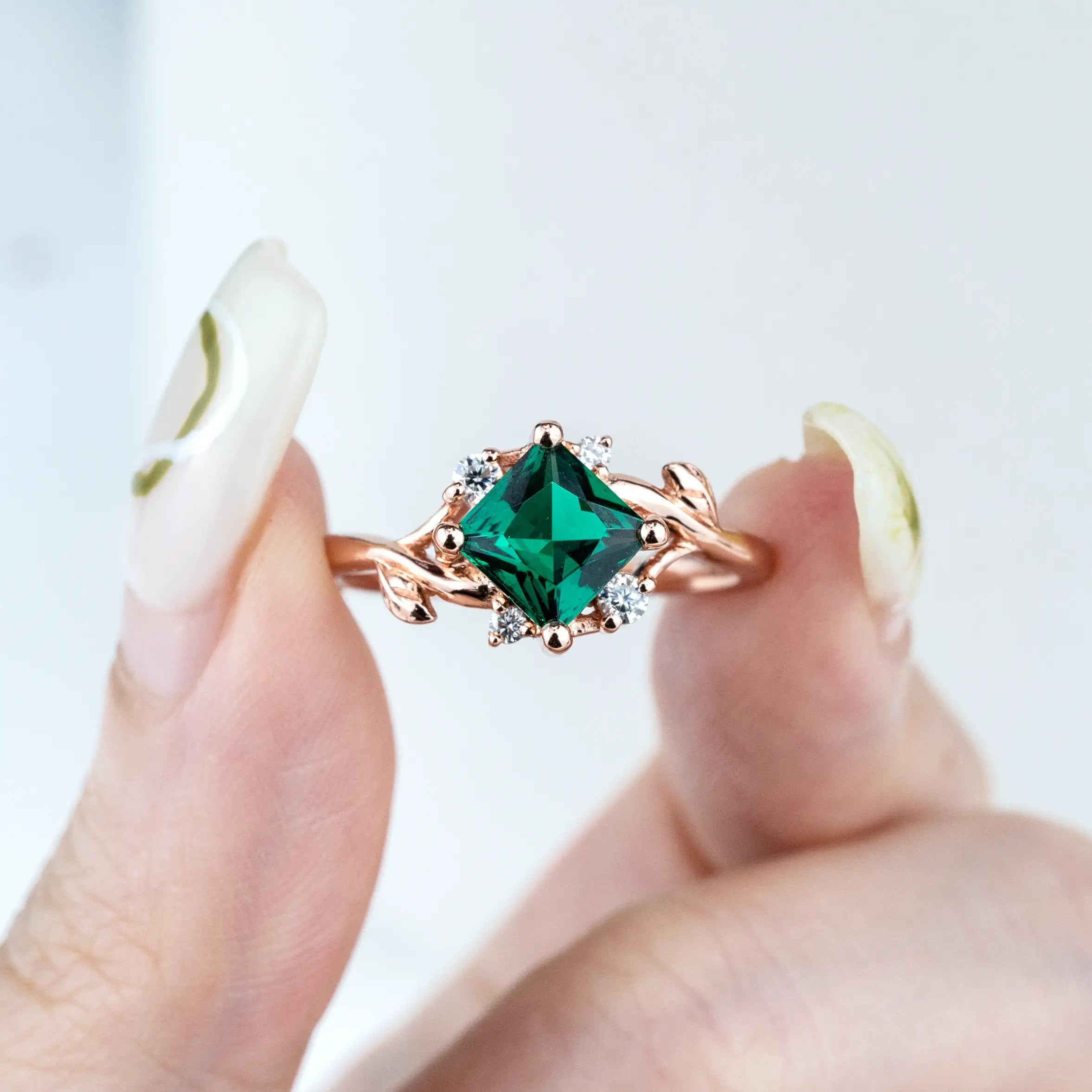 Nature-inspired engagement ring with a vibrant Princess Cut Lab Emerald and moissanite accents,anniversary ring