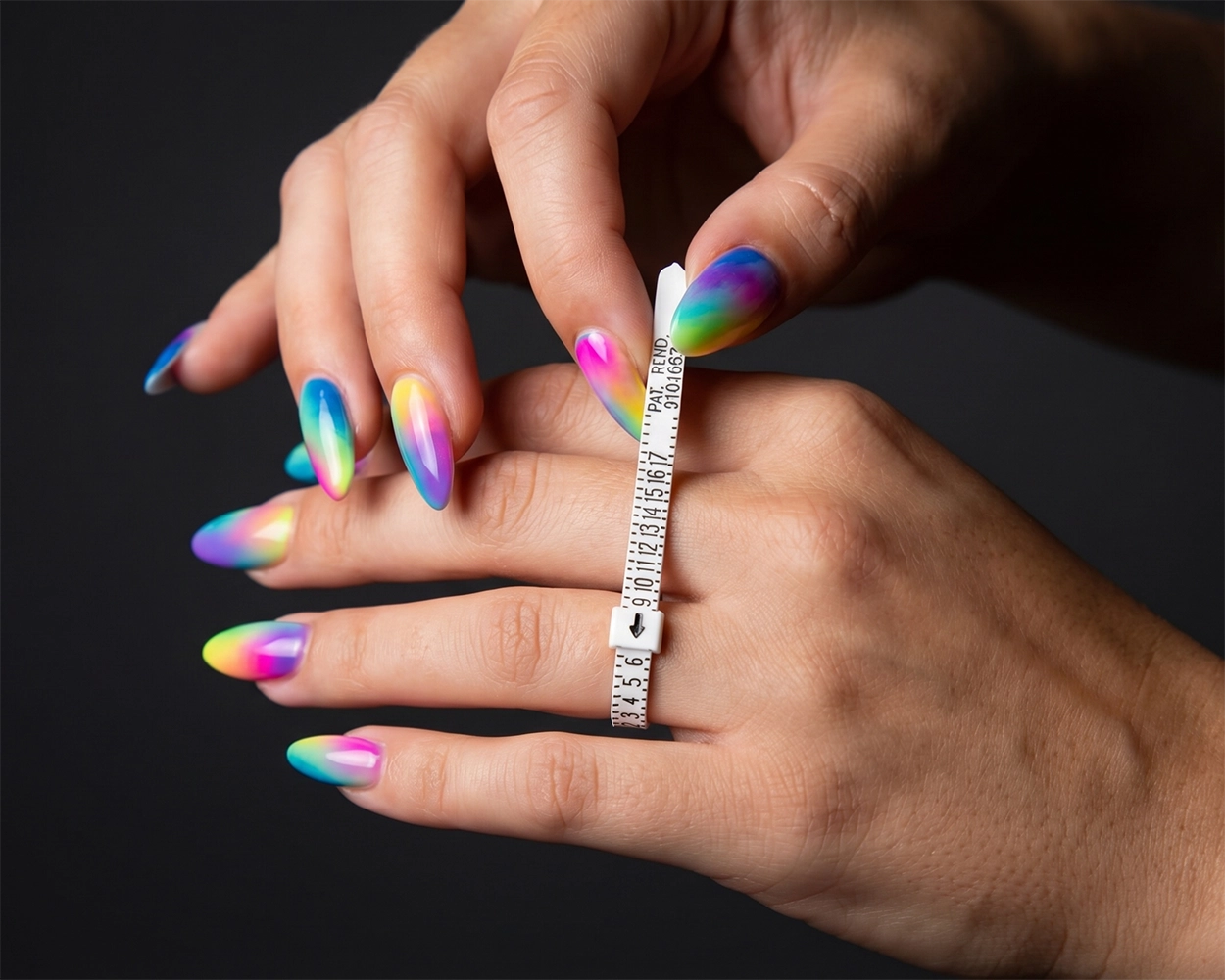 Person using a ring size tool