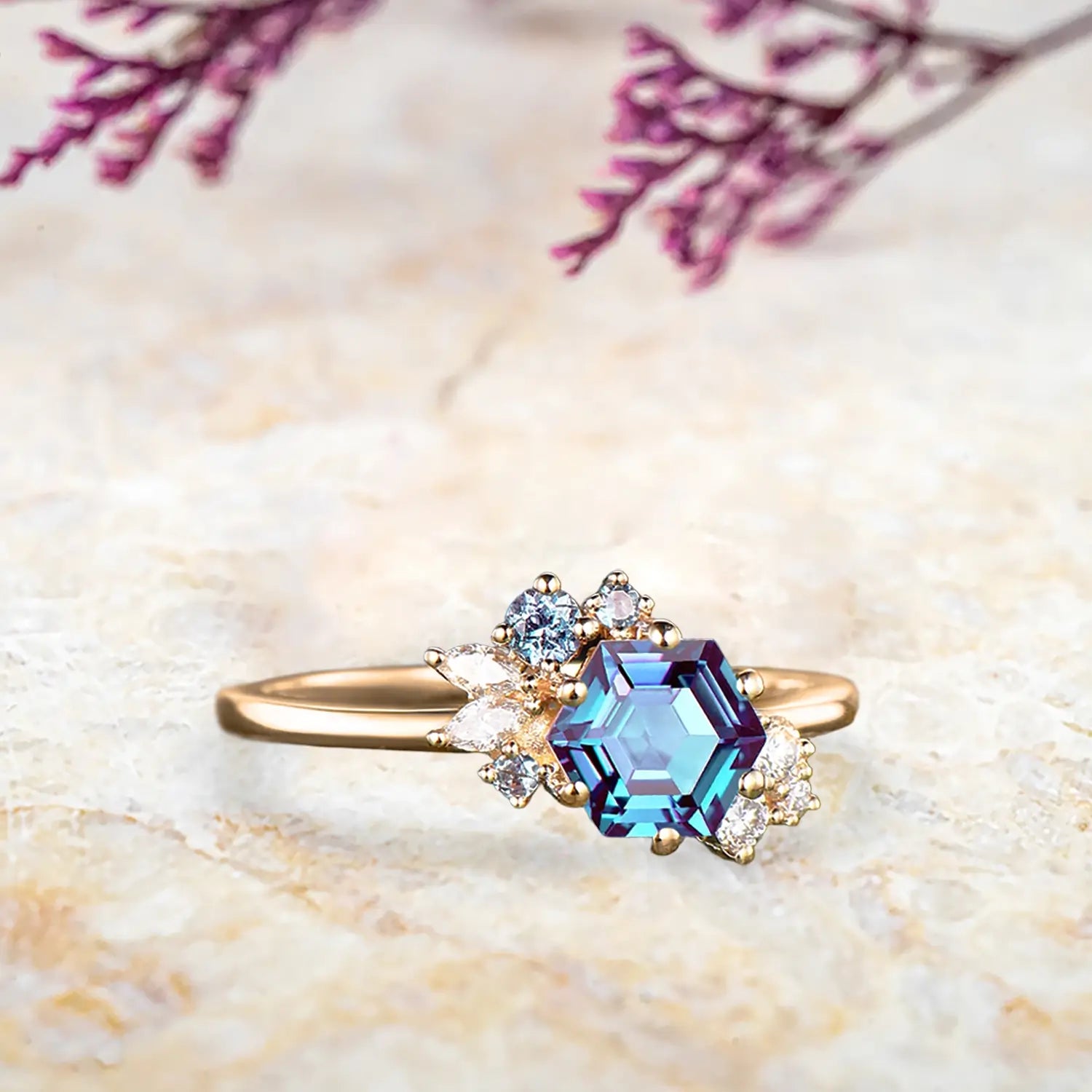 Side view of alexandrite cluster ring showing yellow gold band and hexagon stone detail