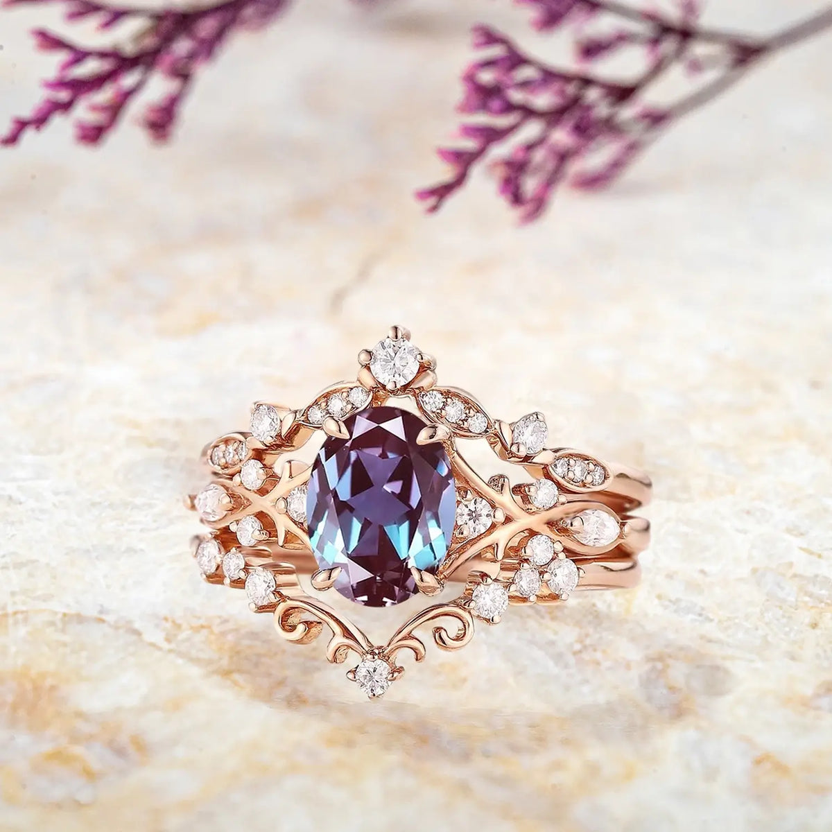 Side view of alexandrite trio ring set with moissanite and pearl band