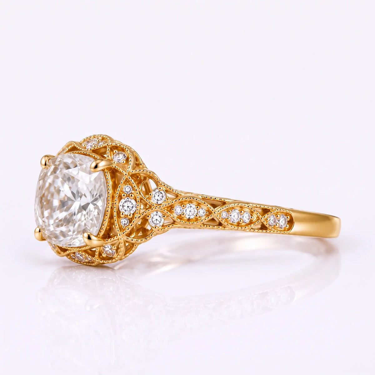 Cushion cut moissanite vintage halo engagement ring in yellow gold