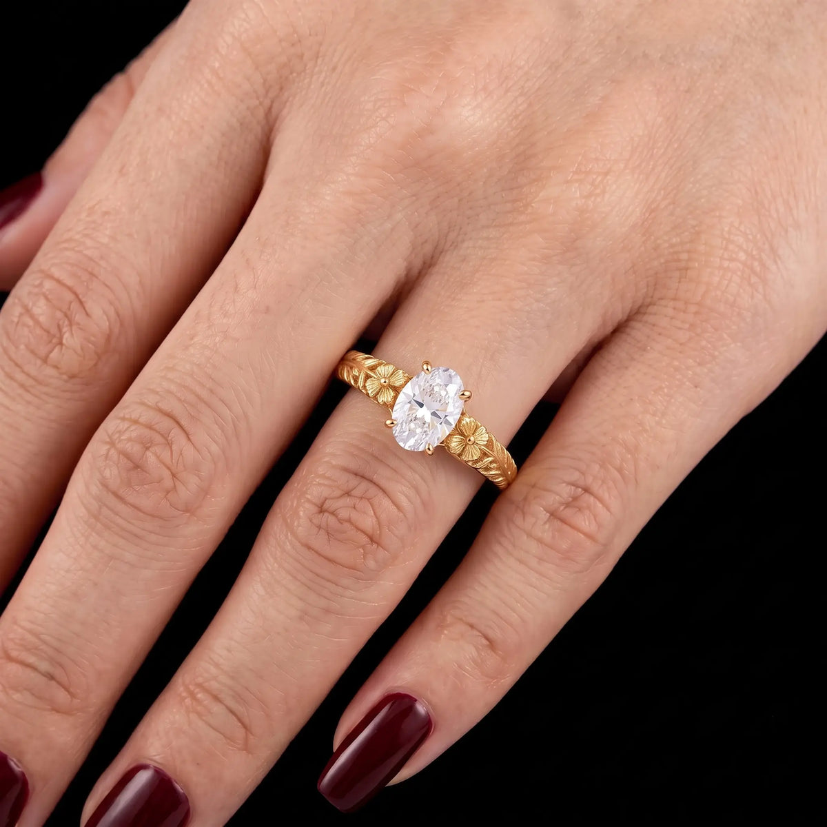 Front view of Avelune floral solitaire engagement ring on hand for ladies anniversary gift