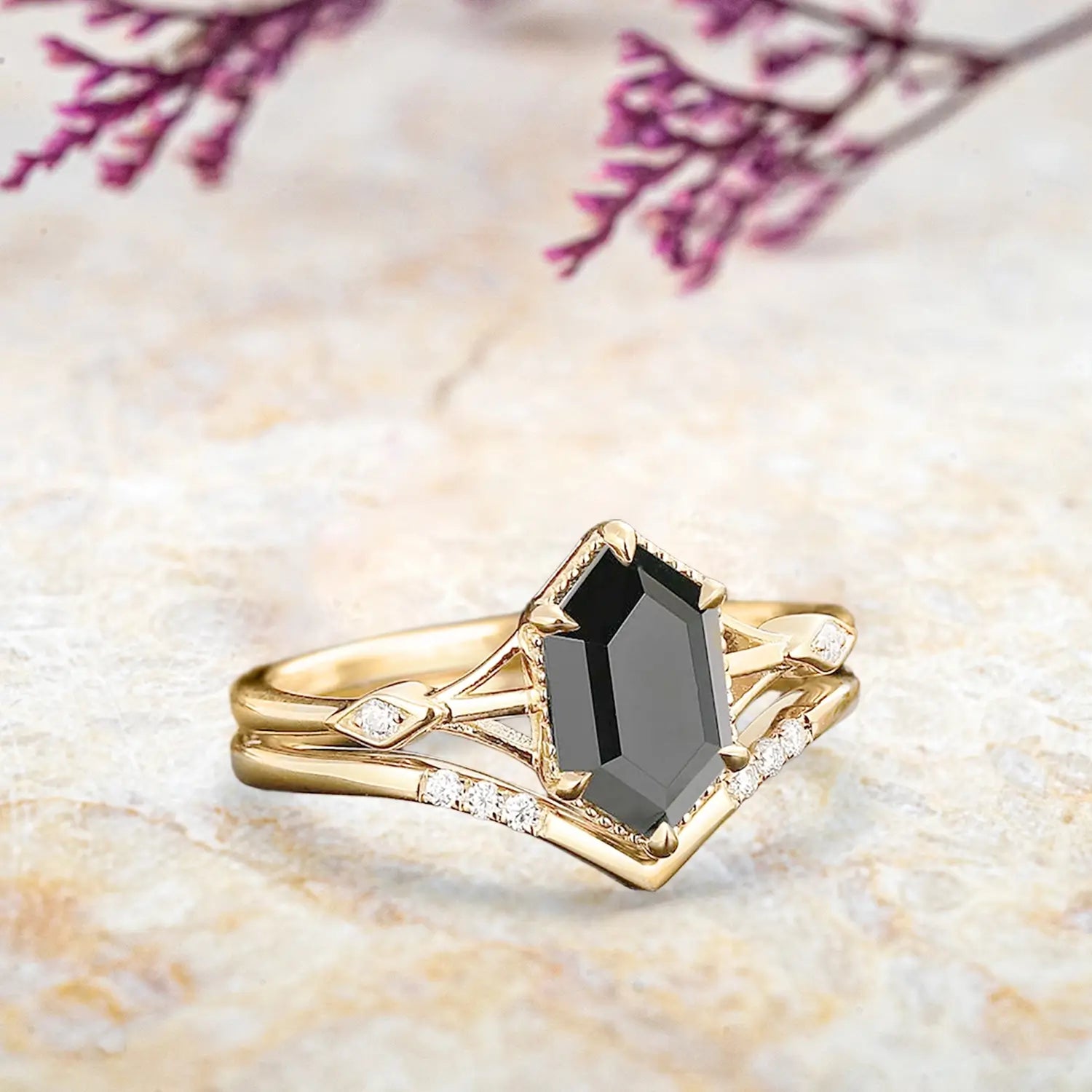 Side view of black onyx bridal set showing yellow gold chevron band and milgrain details