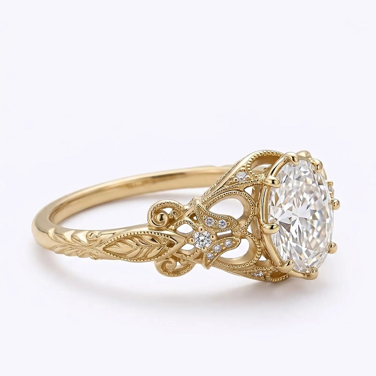 Vintage Calerienne Edwardian-inspired moissanite ring showing botanical openwork scrolls, leaf details and milgrain edging