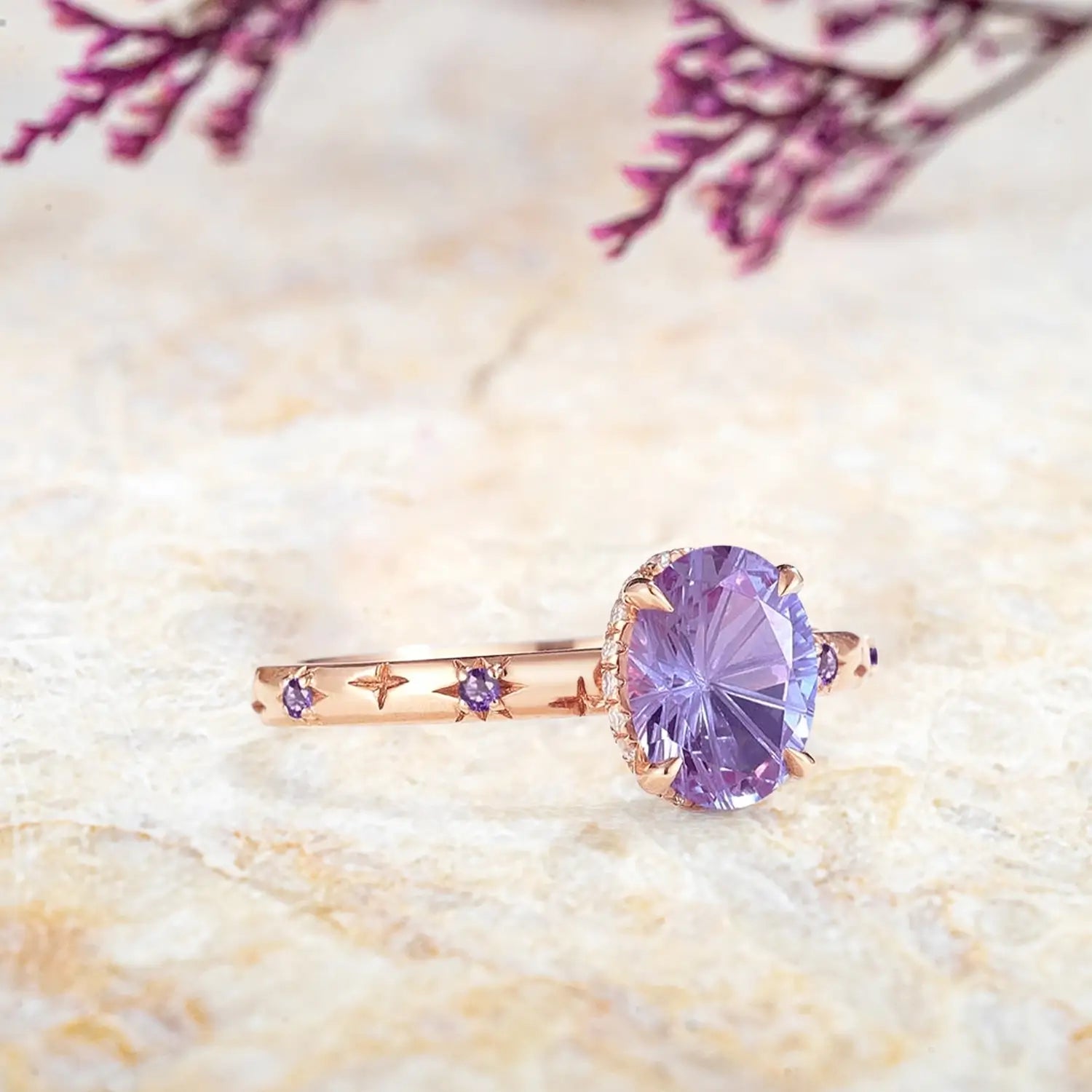 Celestial alexandrite ring with amethyst star accents along the band
