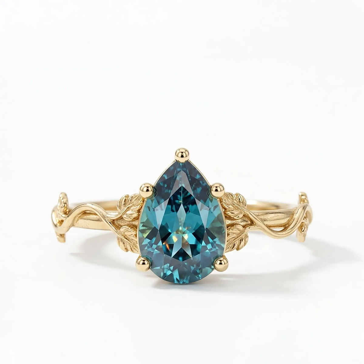 Nature inspired pear cut alexandrite engagement ring with delicate leaf band design, minimalist solitaire June birthstone promise ring handcrafted in gold