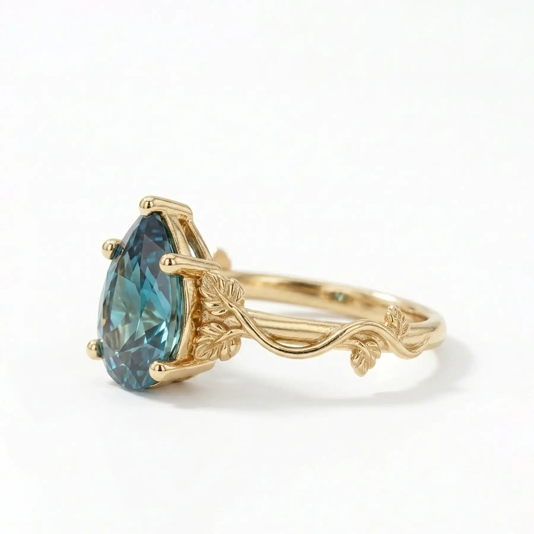 pear cut alexandrite leaf engagement ring in 14k gold, minimalist nature inspired design