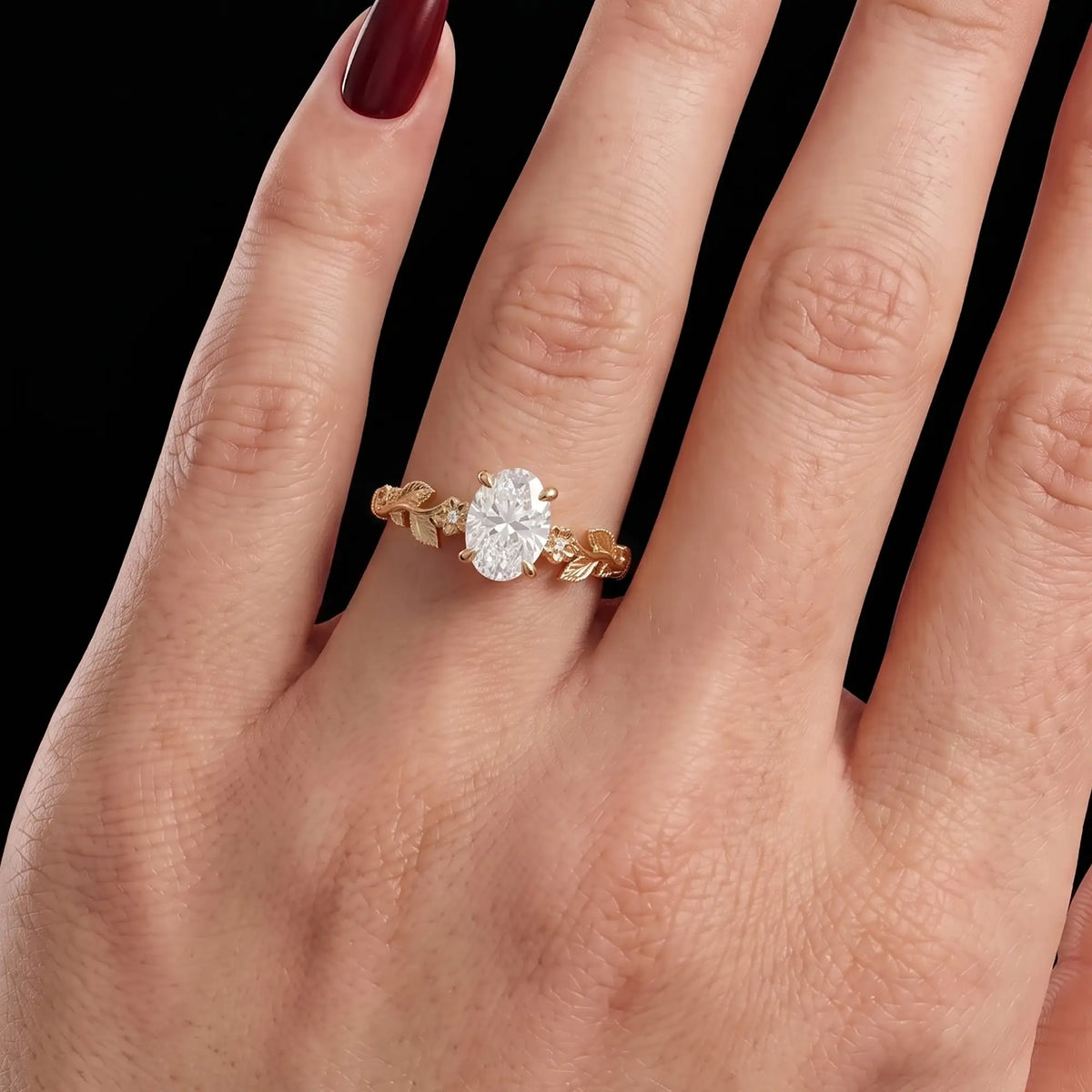 Florielle floral engagement ring worn on hand vintage inspired floral oval diamond ring