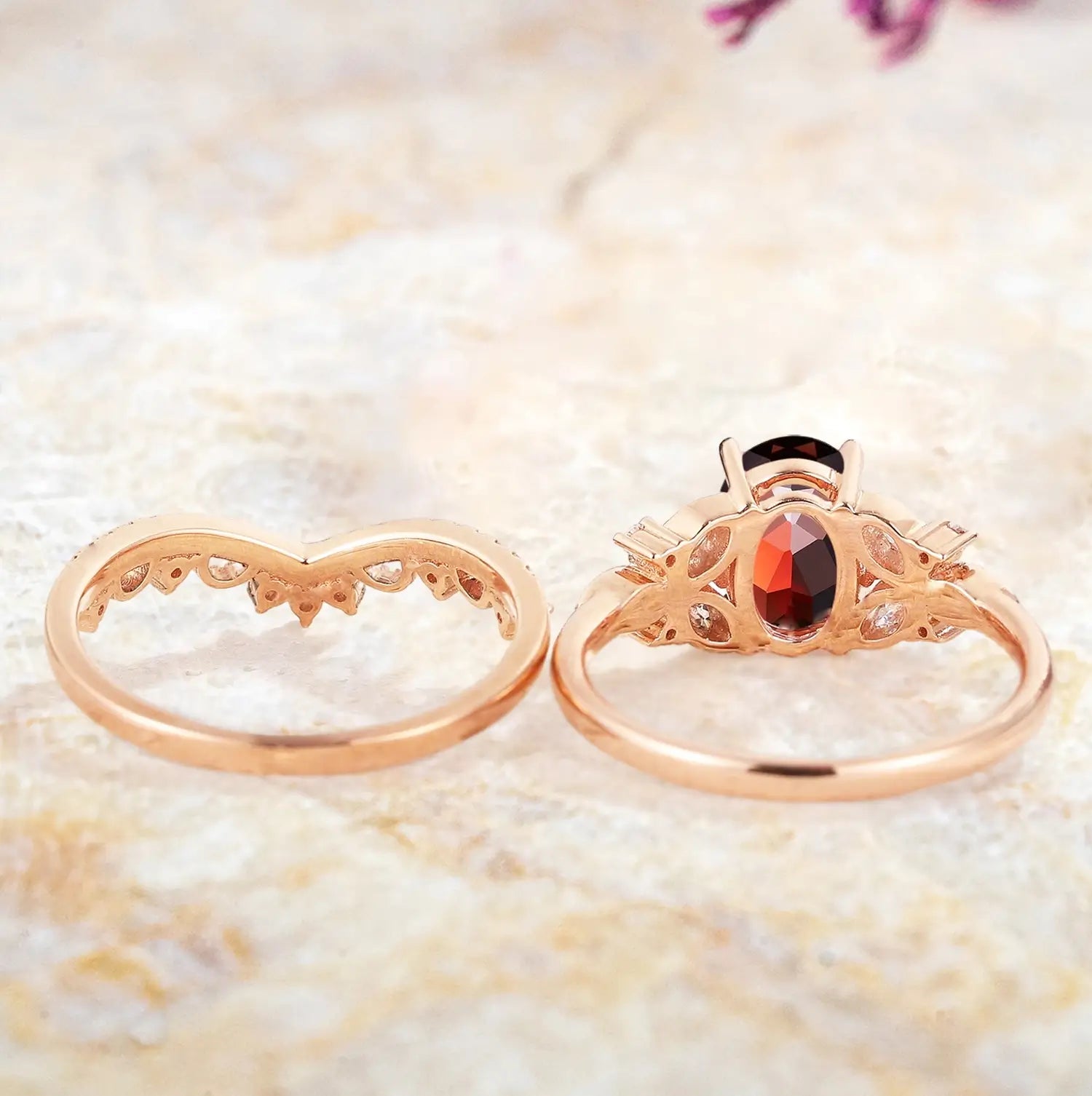 Back view of vintage garnet bridal ring set showing rose gold craftsmanship
