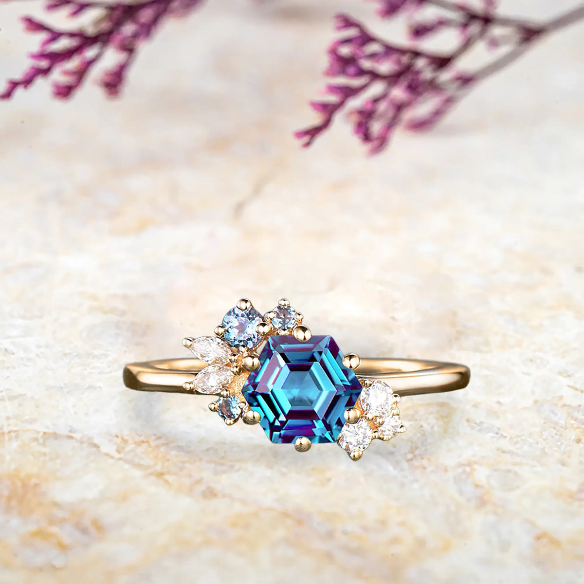Hexagon alexandrite engagement ring in yellow gold with diamond cluster Art Deco design