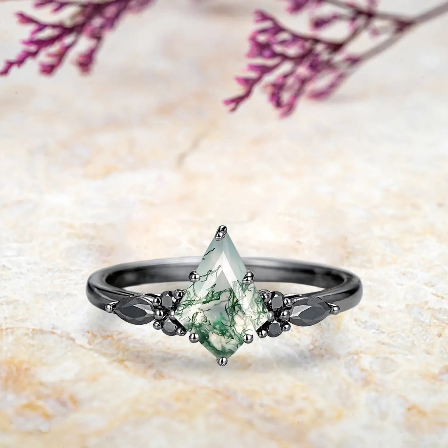 Orleone Kite moss agate engagement ring with black moissanite marquise cluster and chevron wedding band set in black gold