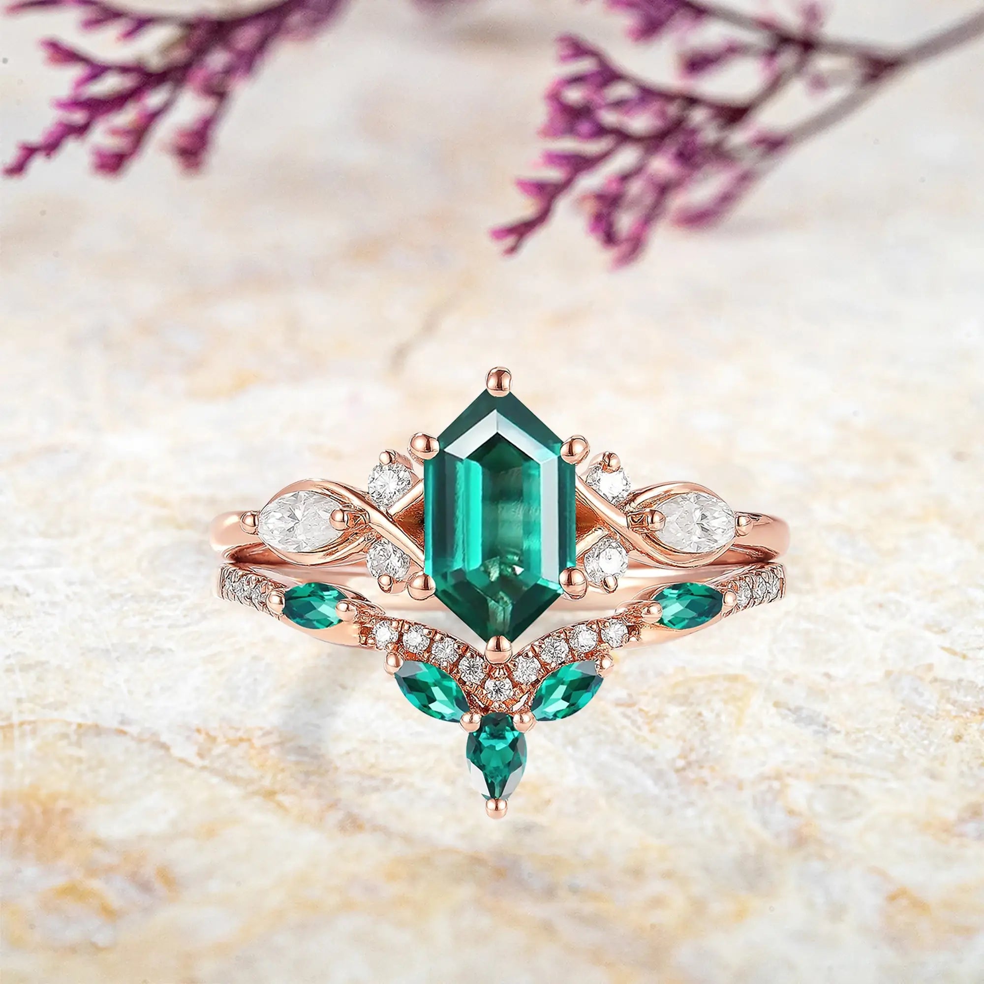 hexagon cut emerald engagement ring set in rose gold orleone jewelry