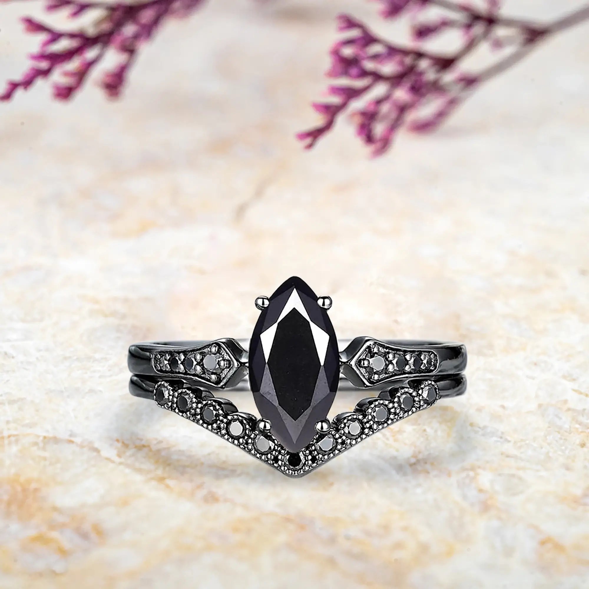 Marquise black onyx engagement ring with vintage milgrain shoulders and curved chevron wedding band set in black gold