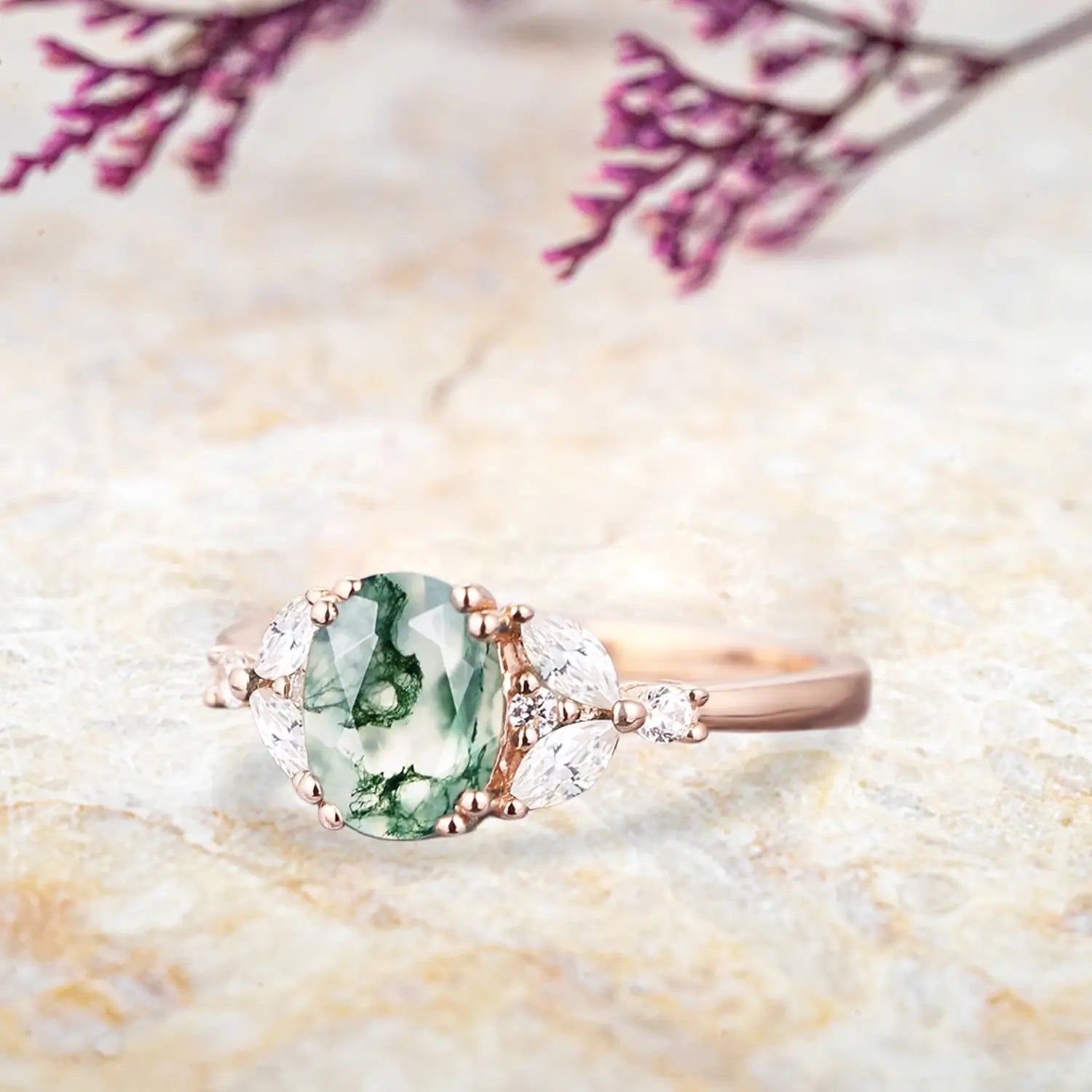 Back view of moss agate engagement ring showing rose gold band and setting structure