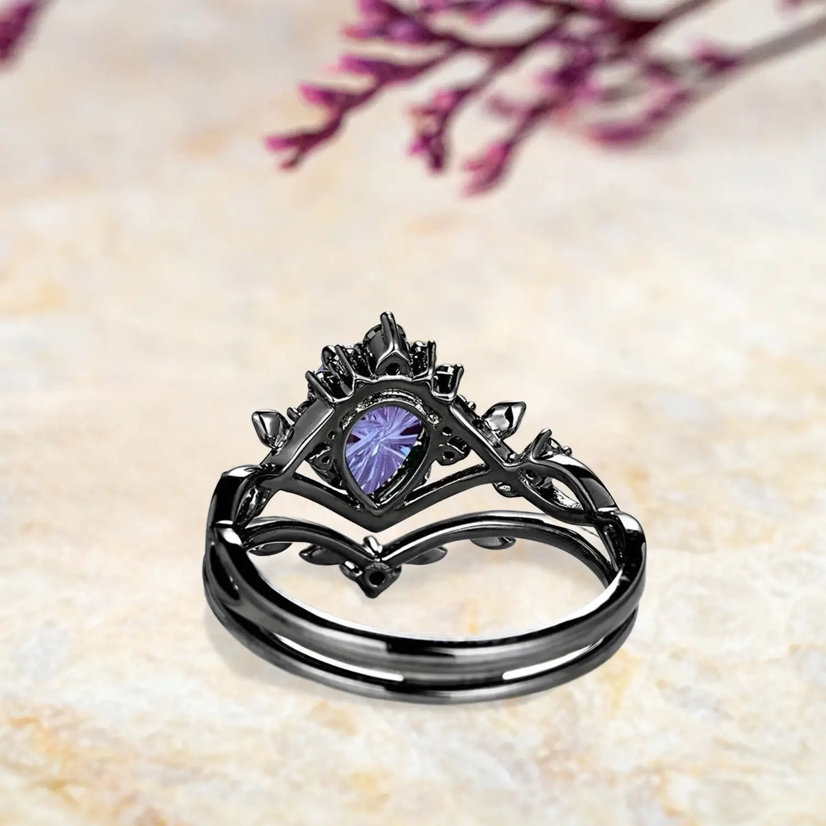 Back view of Gothic alexandrite engagement ring set showing nature inspired leaf crown and curved wedding band craftsmanship