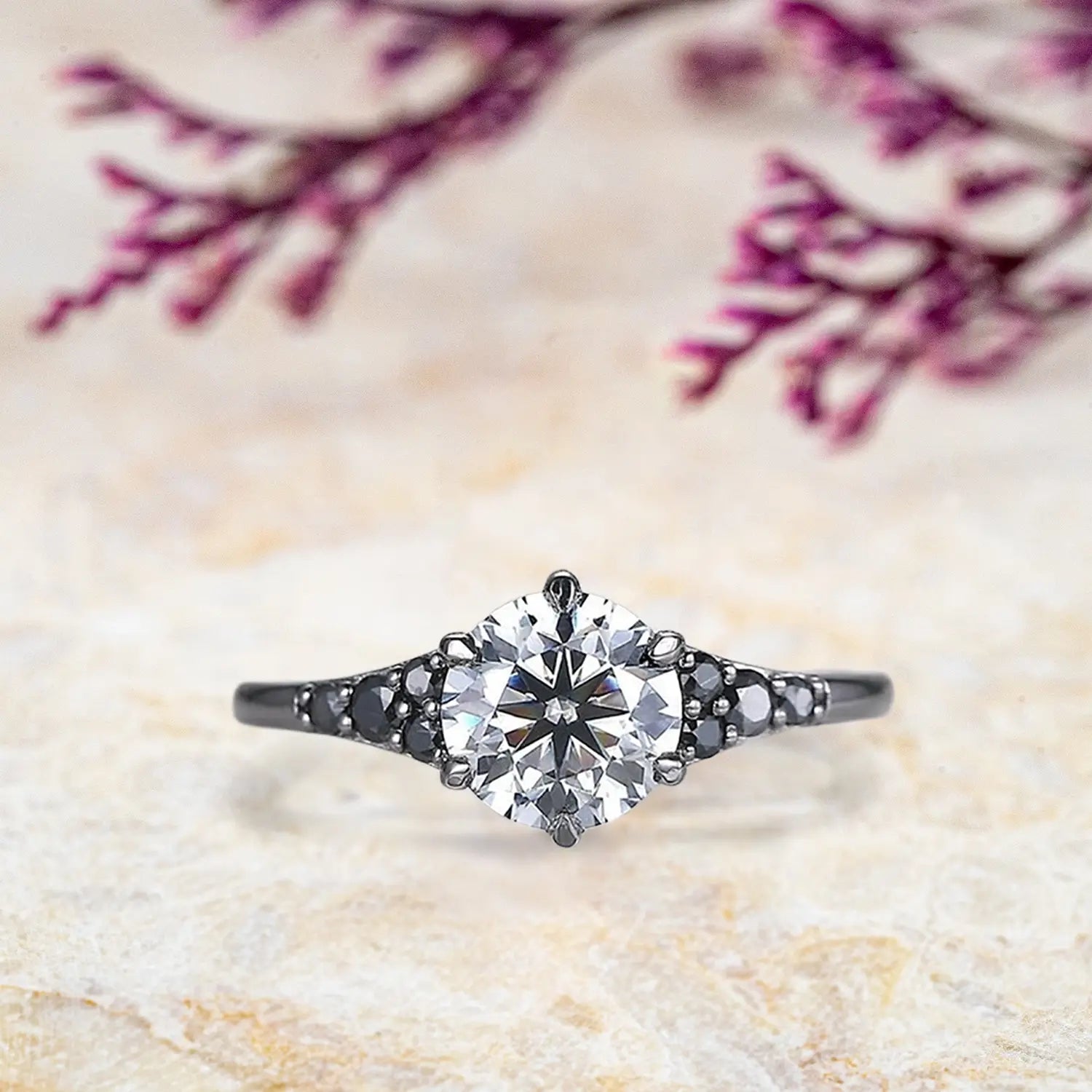 Black gold engagement ring with round moissanite and onyx cluster accents