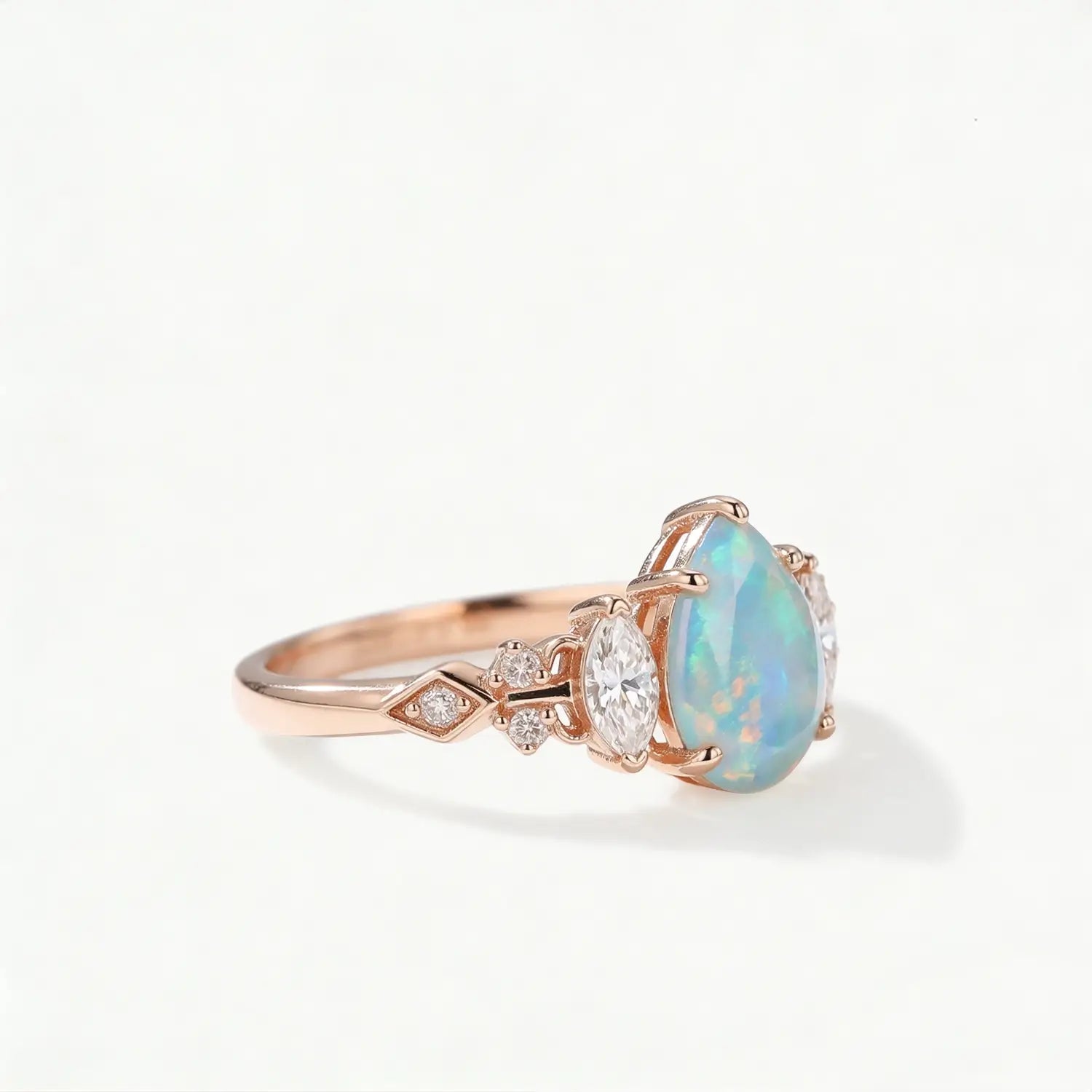 unique opal engagement ring marquise and round moissanite band