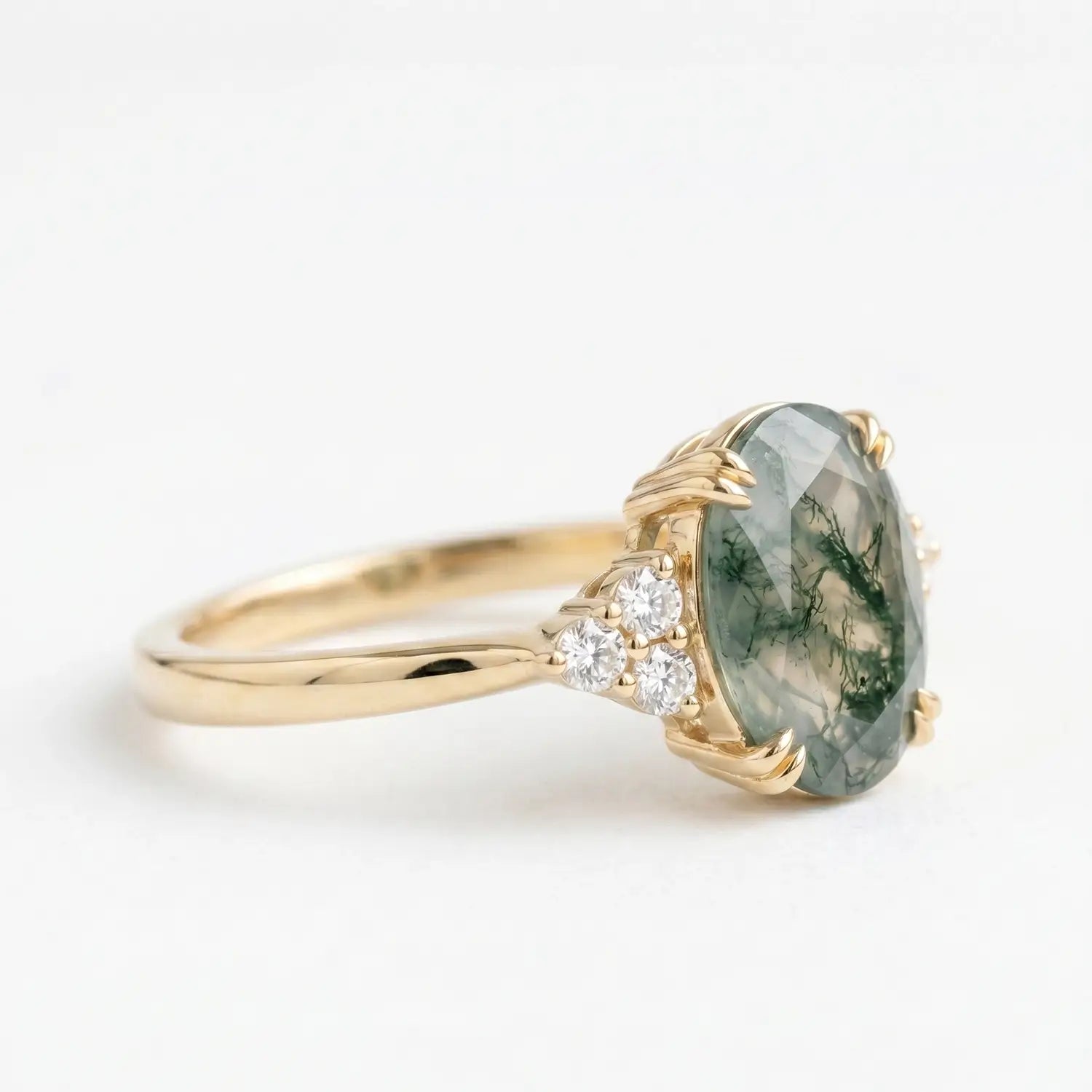 Unique alternative bridal gemstone ring with round side stones in solid K gold