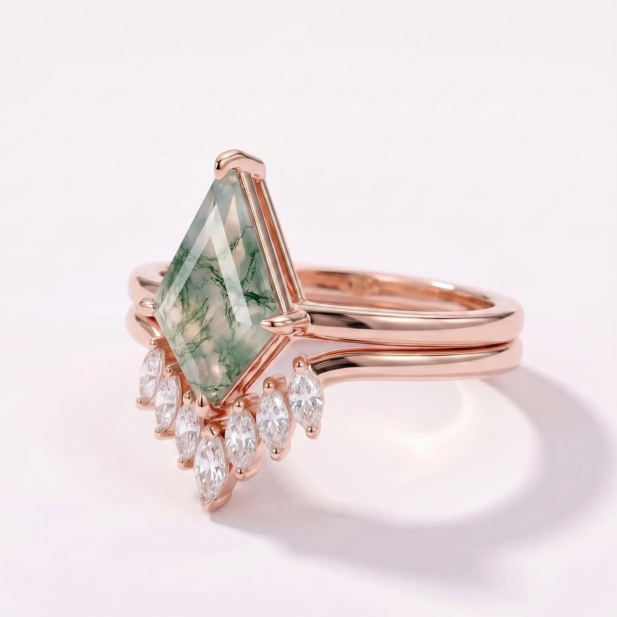 Side profile view of nested kite moss agate ring set showcasing flush alignment and secure prong craftsmanship