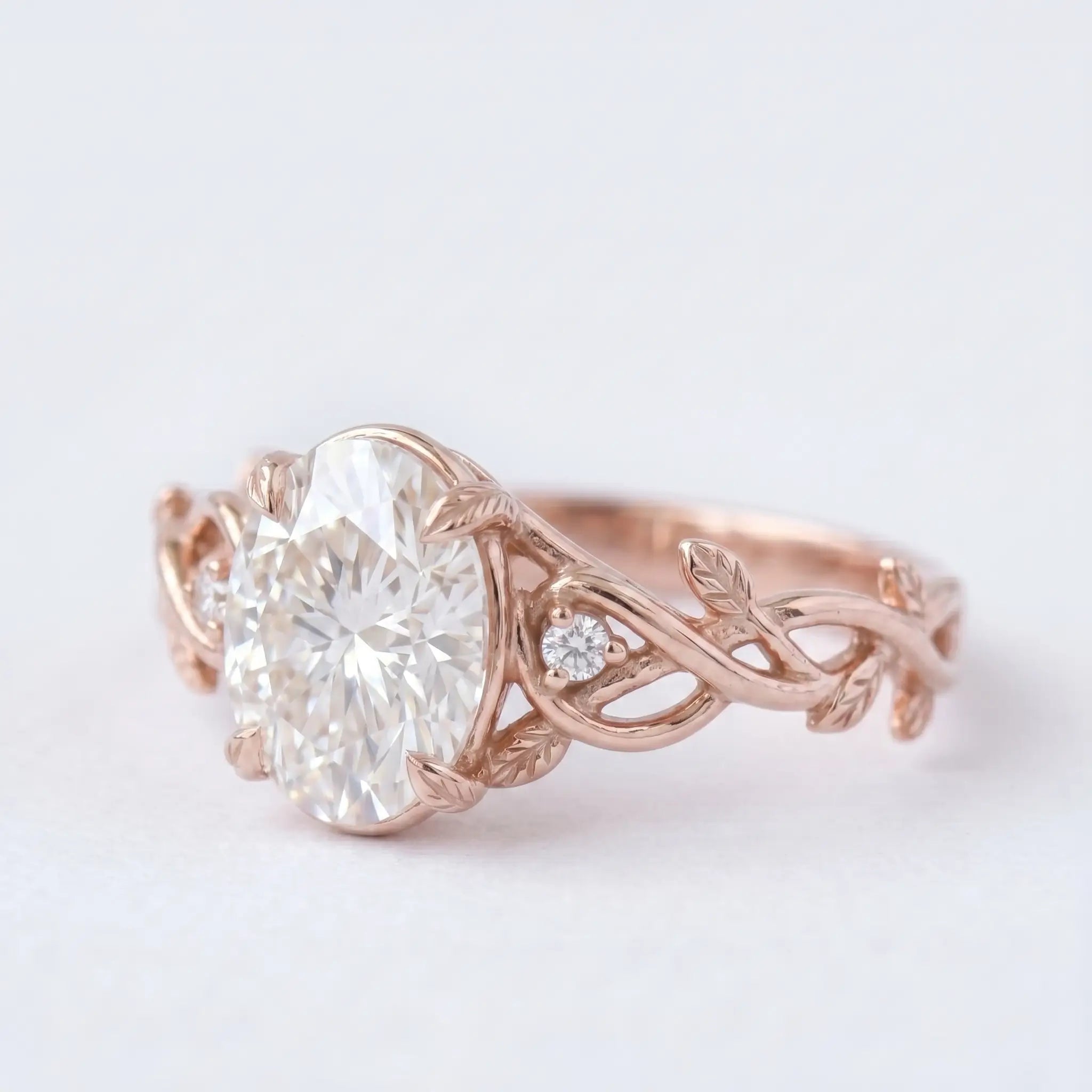 Side view profile of alternative bridal moissanite ring highlighting the detailed low-profile tree branch filigree