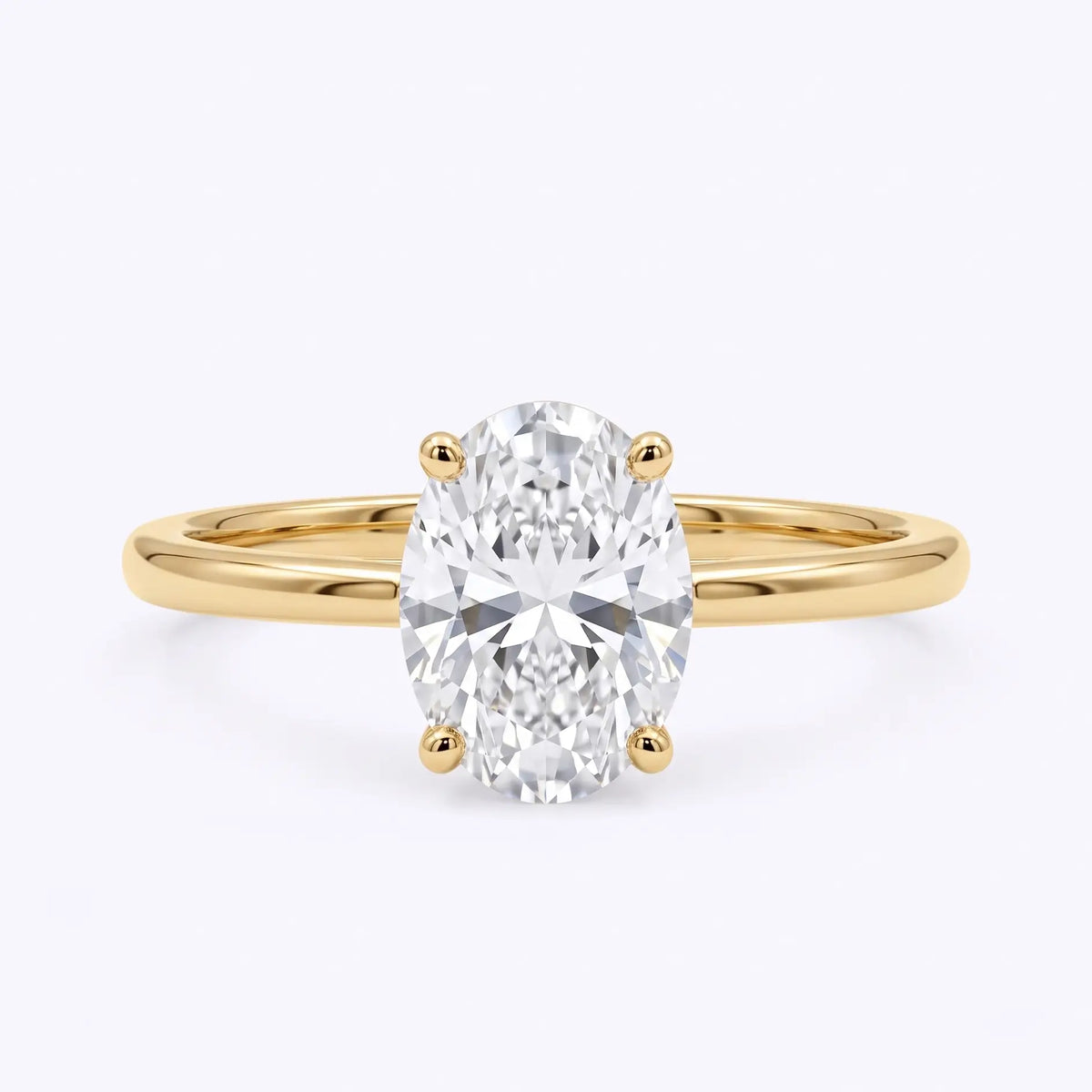 Classic oval lab diamond solitaire engagement ring in yellow gold