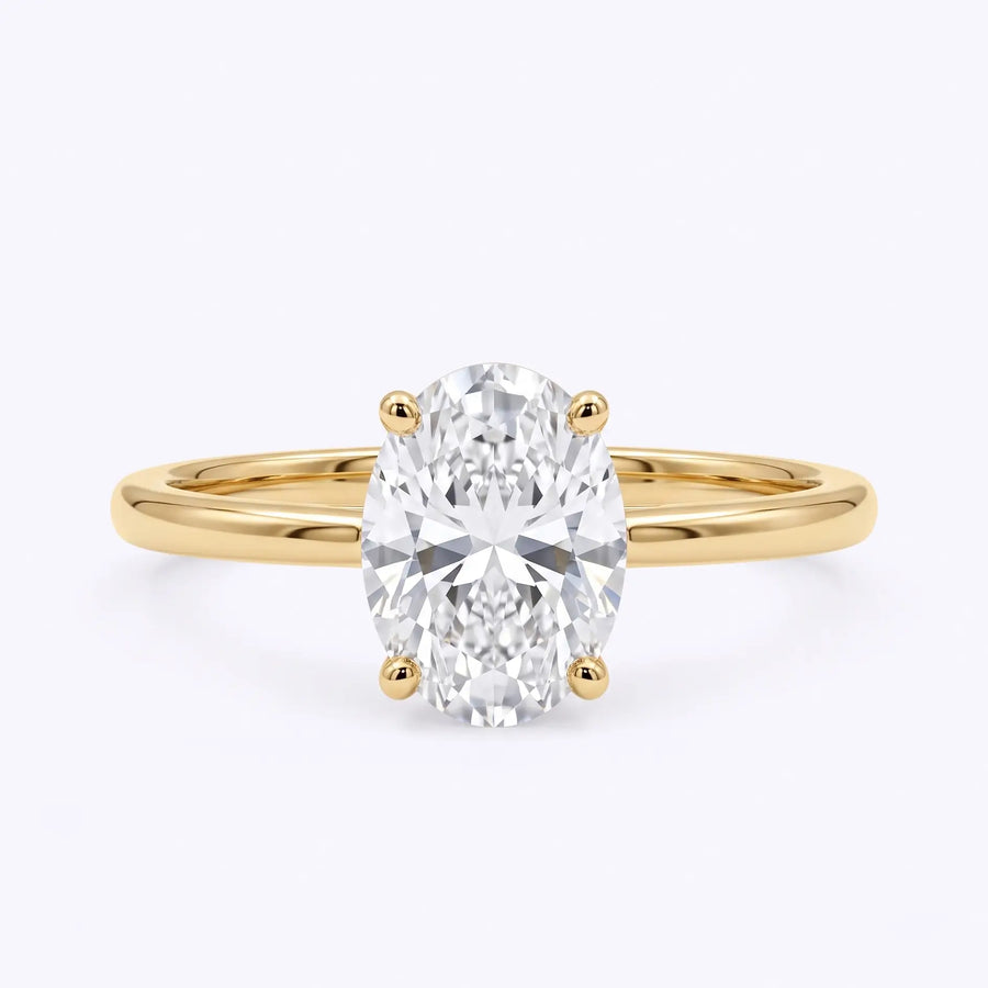 Classic oval lab diamond solitaire engagement ring in yellow gold