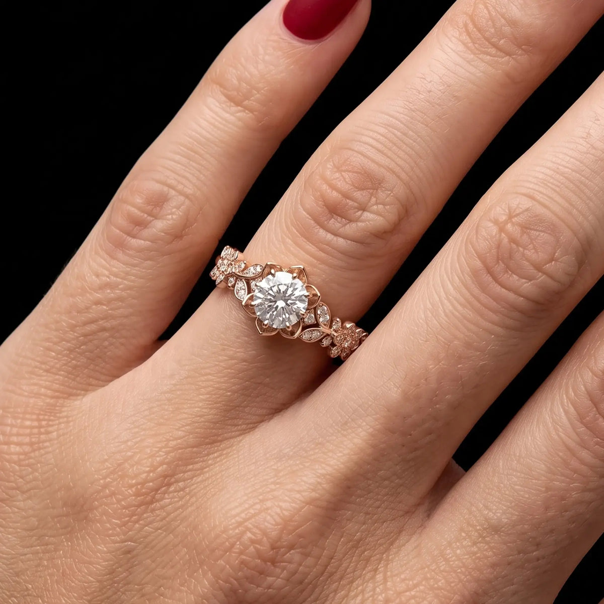 Round botanical moissanite engagement ring worn on hand