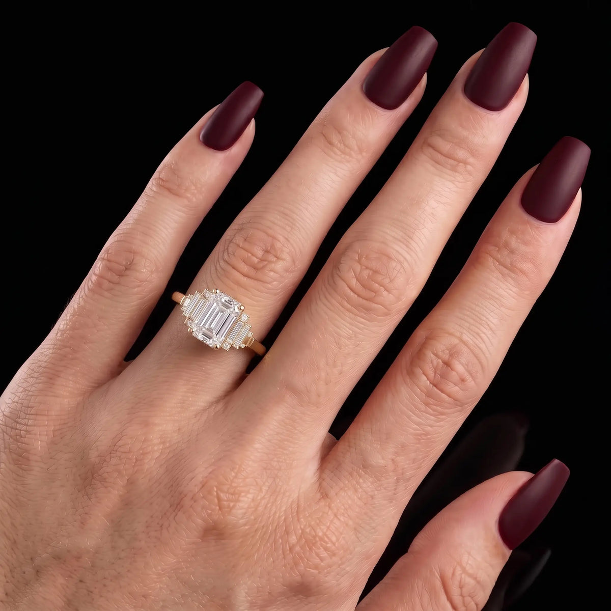 Geometric moissanite cluster engagement ring worn on hand