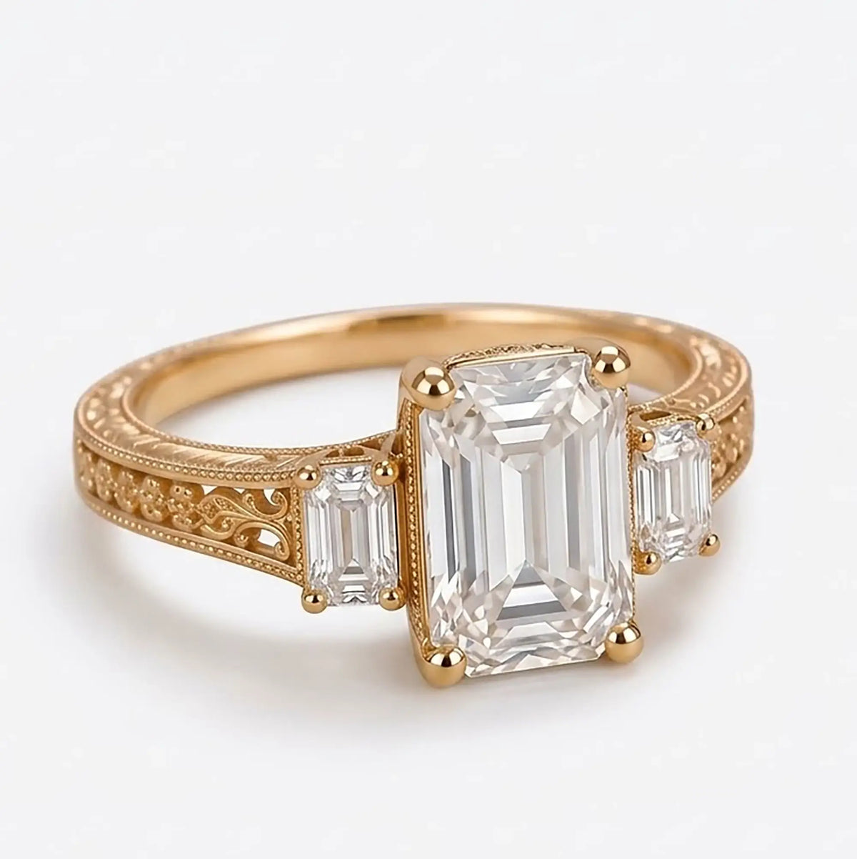 Front view of emerald cut lab grown diamond three stone engagement ring with matching rectangular diamond side stones