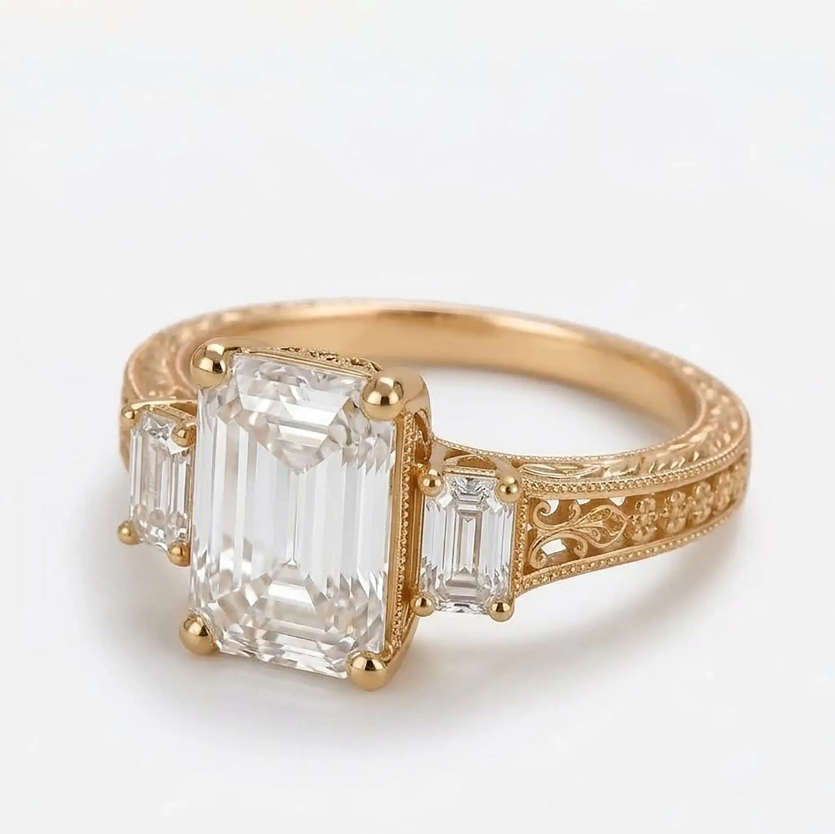 Side profile of antique inspired emerald cut diamond engagement ring showing openwork filigree and milgrain details