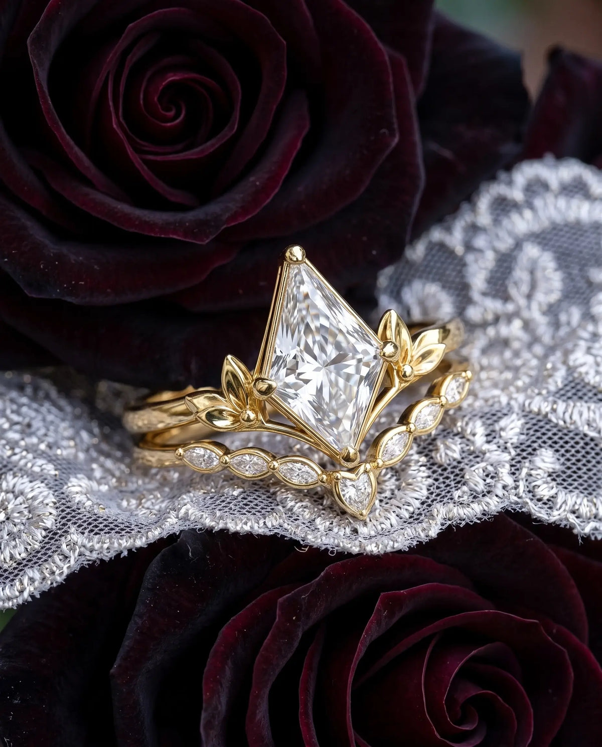 Nature-inspired kite moissanite bridal ring set styled in an elegant jewelry scene