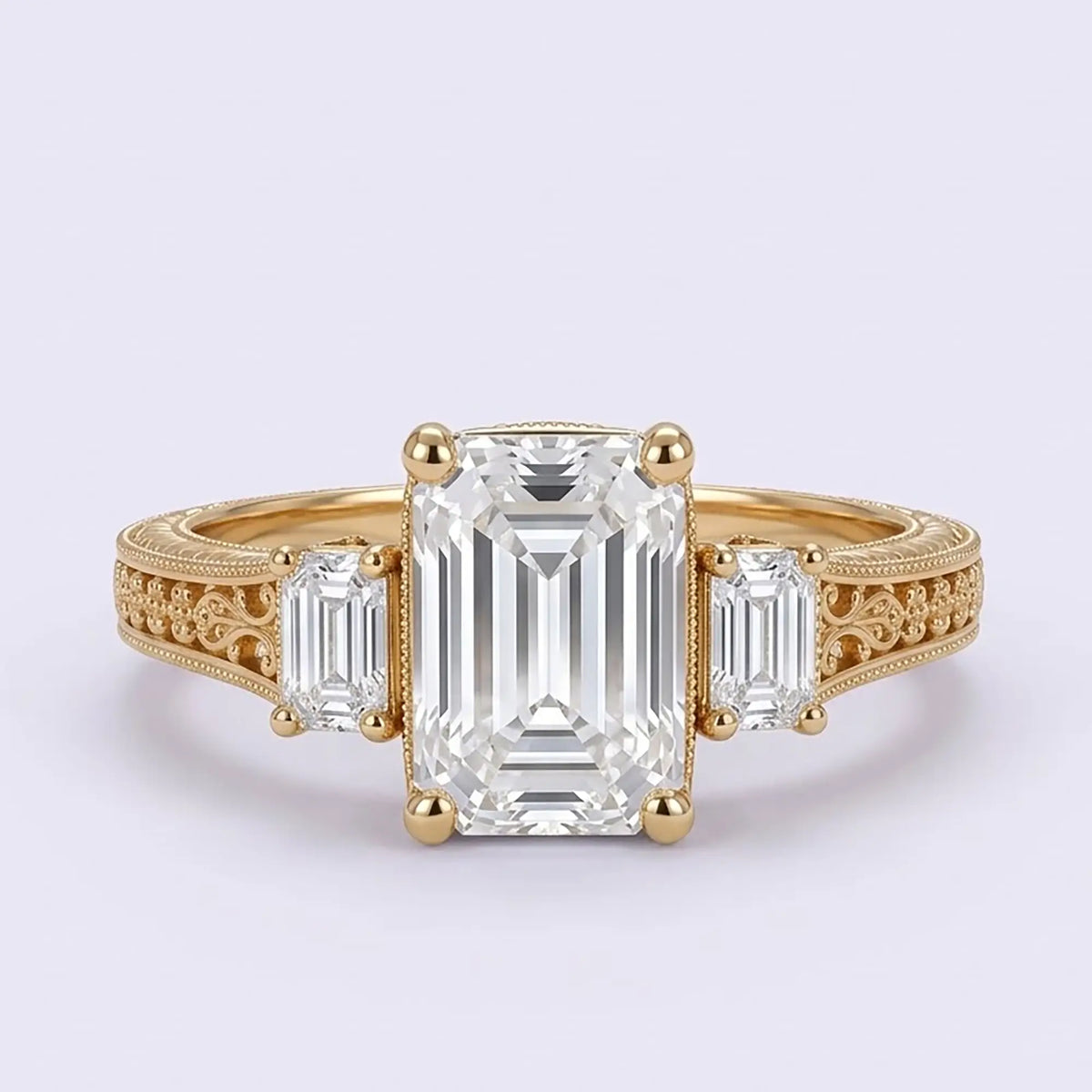 Vintage emerald cut lab diamond three stone engagement ring with antique filigree detailing in yellow gold