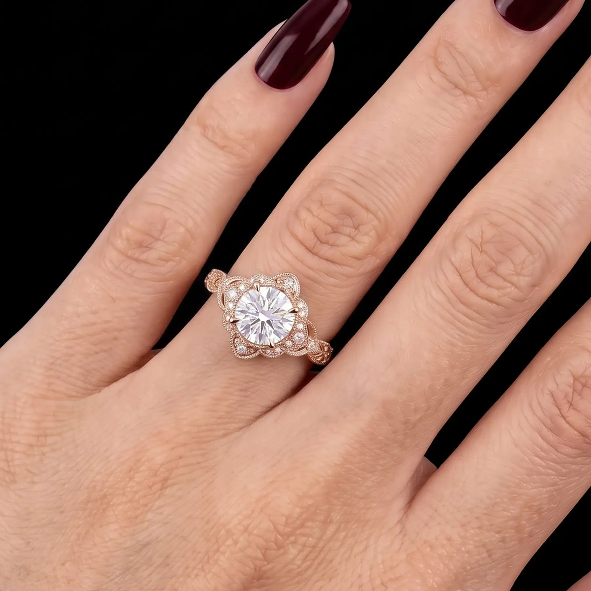 Vintage Edwardian moissanite engagement ring worn on hand