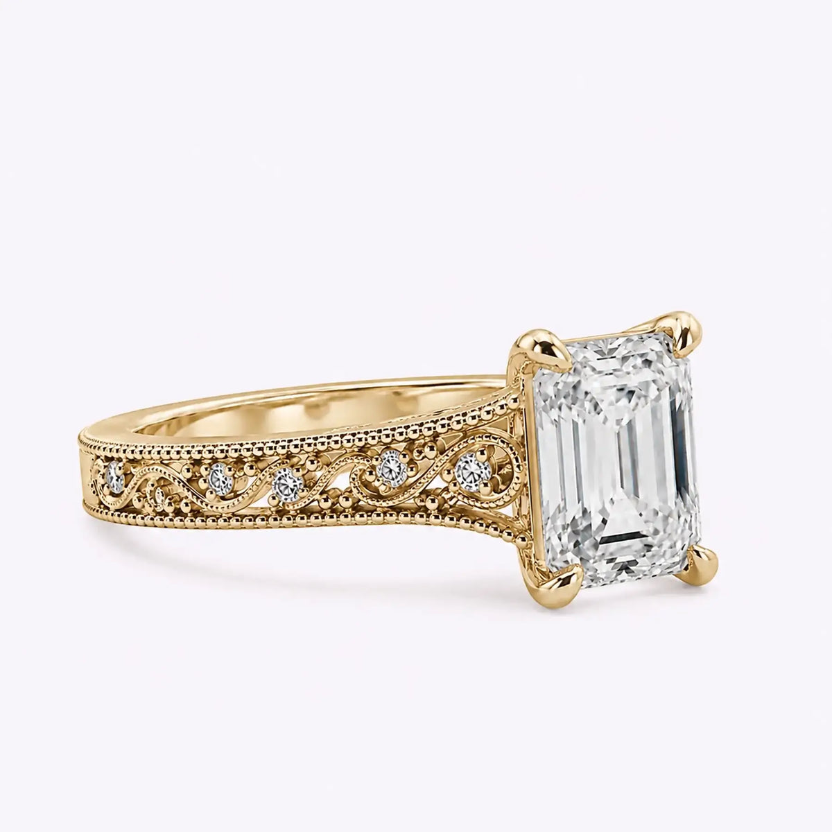 Side view of emerald cut lab diamond ring showing the detailed openwork band
