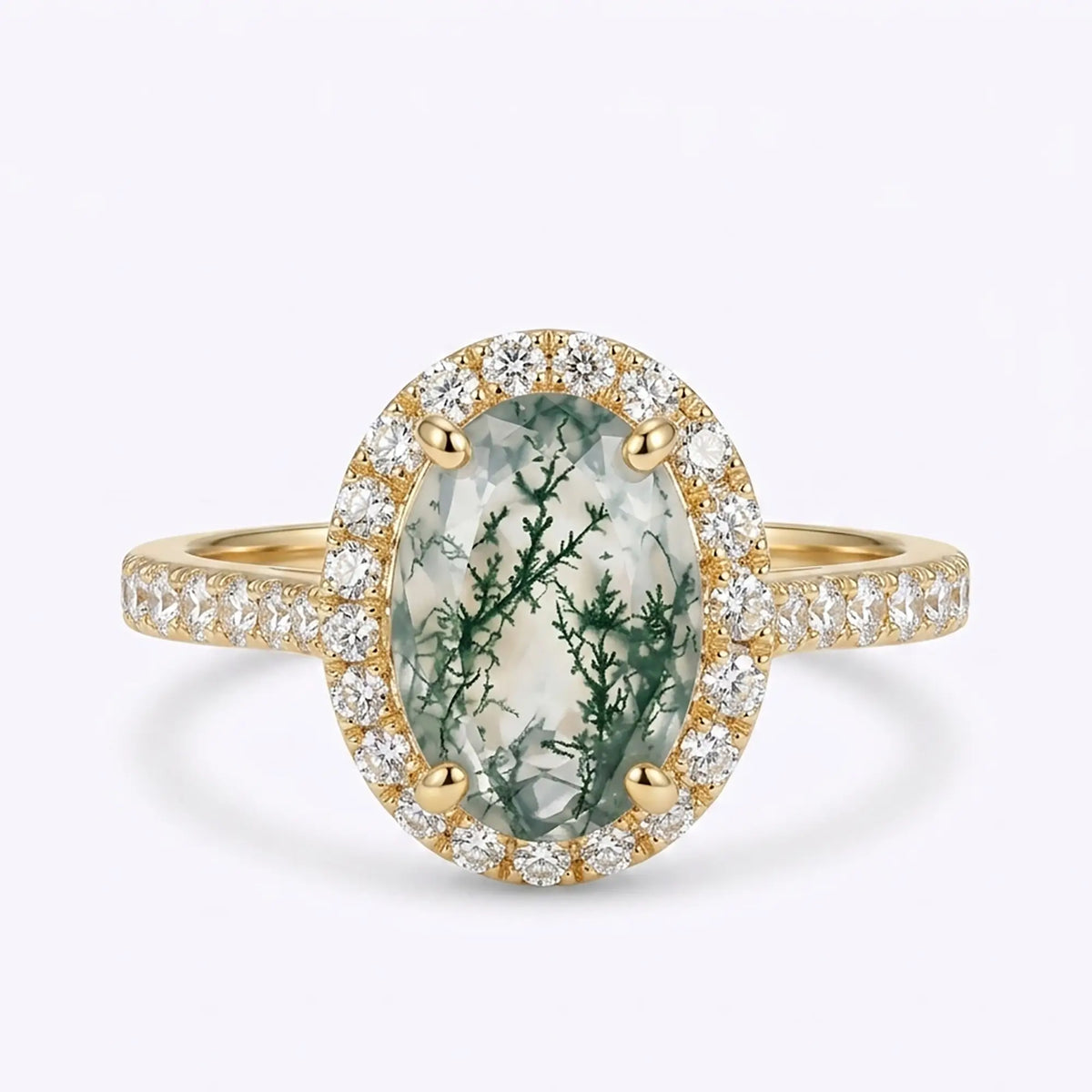 Classic oval moss agate halo engagement ring with round moissanite accents in yellow gold