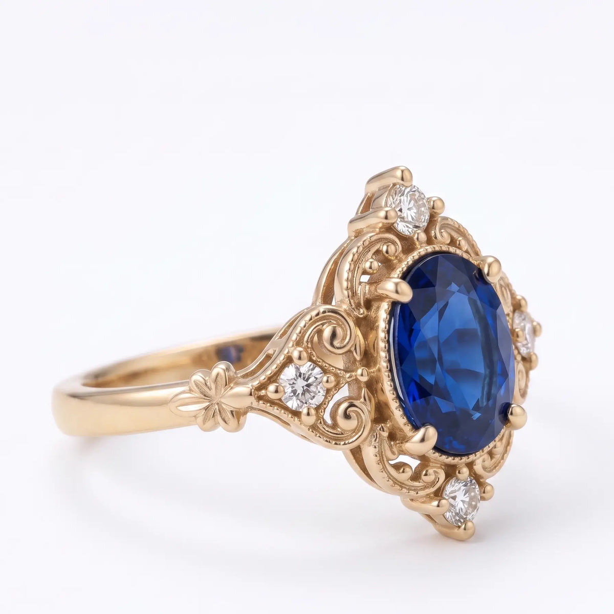 Front view of oval lab sapphire ring with antique-inspired detailing