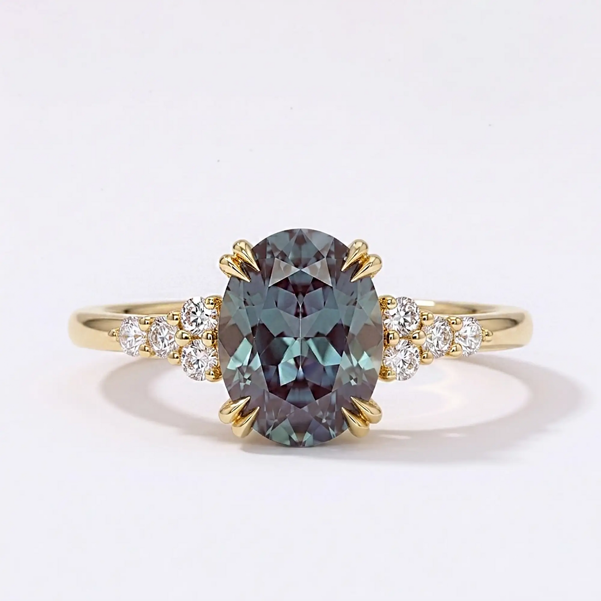 Handcrafted vintage-inspired oval lab-grown alexandrite Art Deco cluster engagement ring in solid yellow gold by Orleone