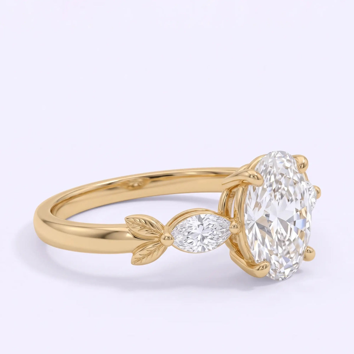 Side profile of oval moissanite three stone engagement ring showing its prong setting and elegant gold shoulders