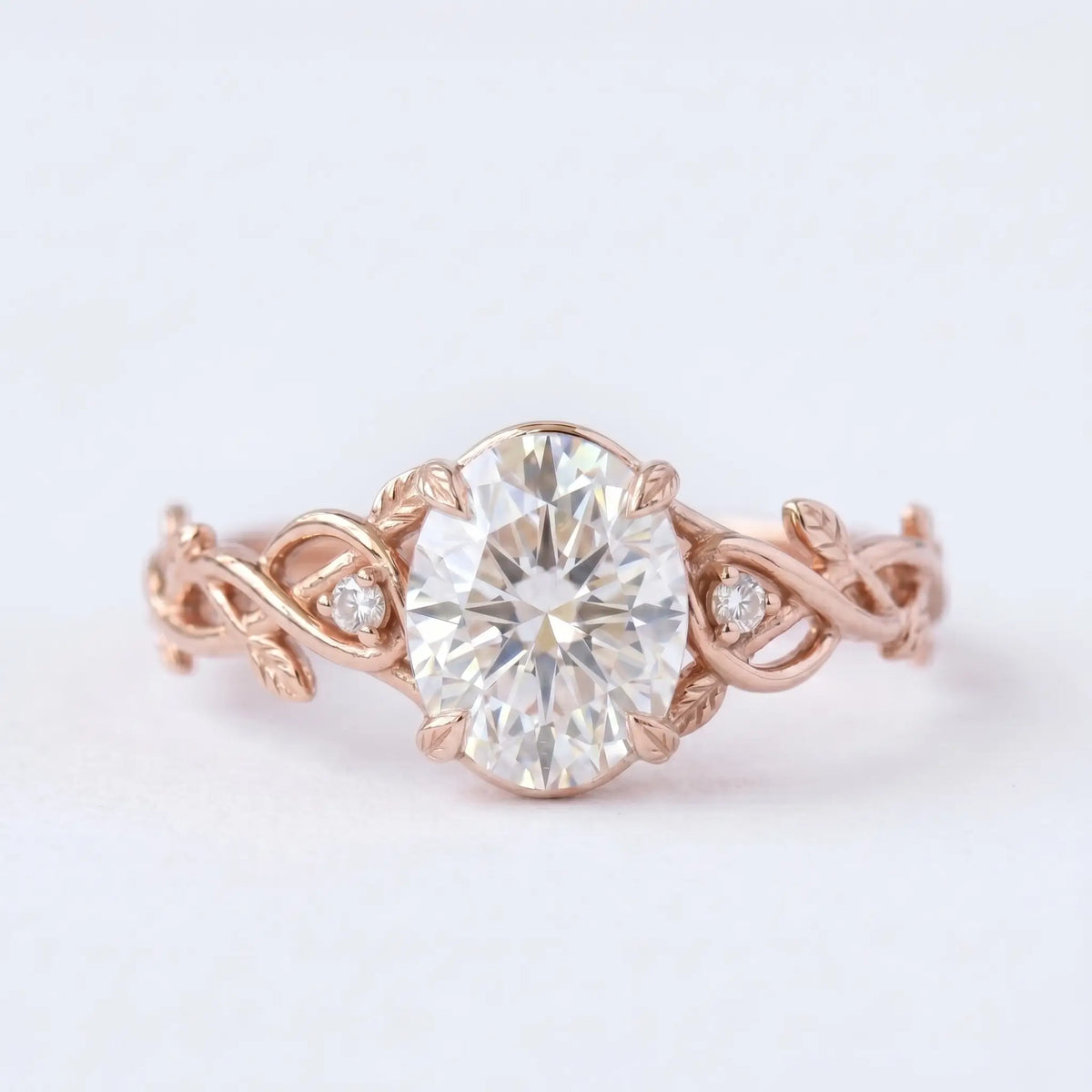 Handcrafted oval moissanite leaf prongs entwined vine engagement ring - Elowen by Orleone