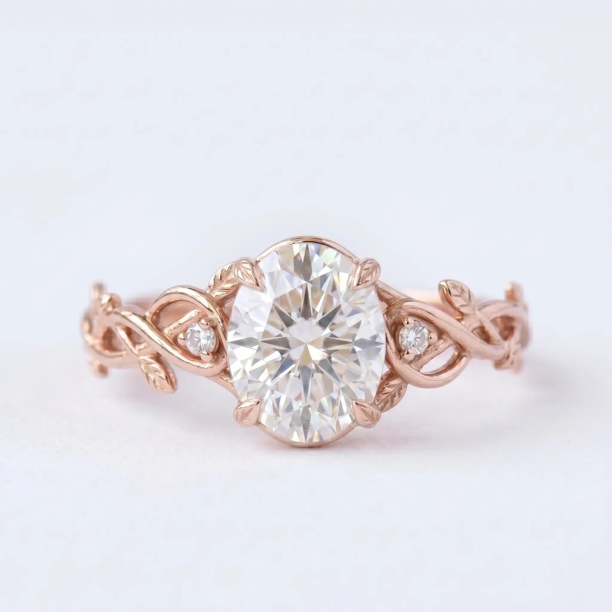 Handcrafted oval moissanite leaf prongs entwined vine engagement ring - Elowen by Orleone