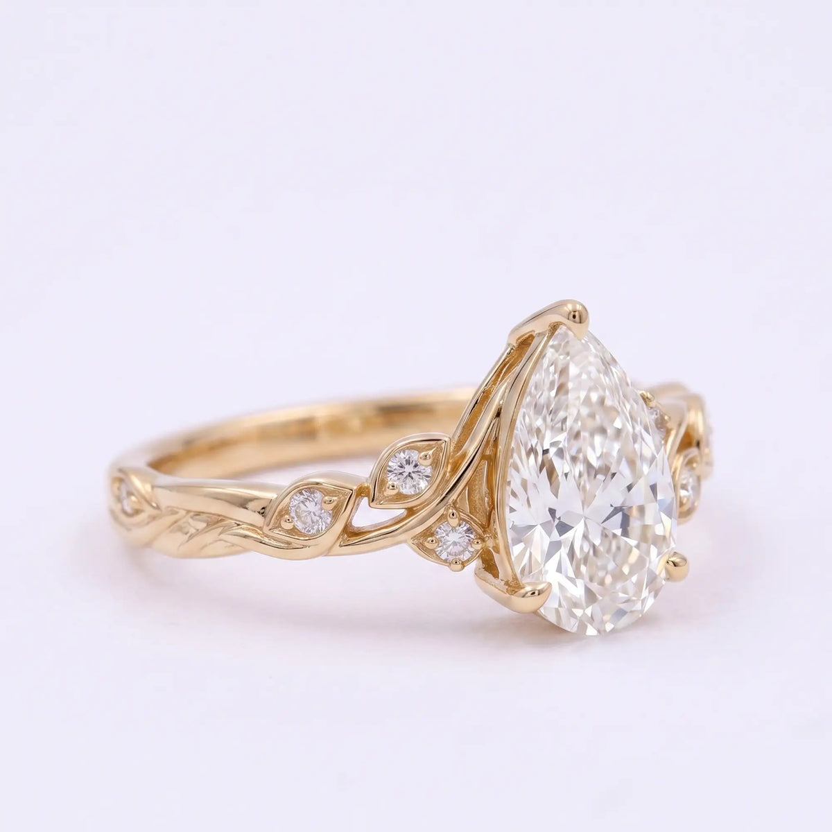 Pear shaped moissanite leaf ring for women with elegant nature inspired design